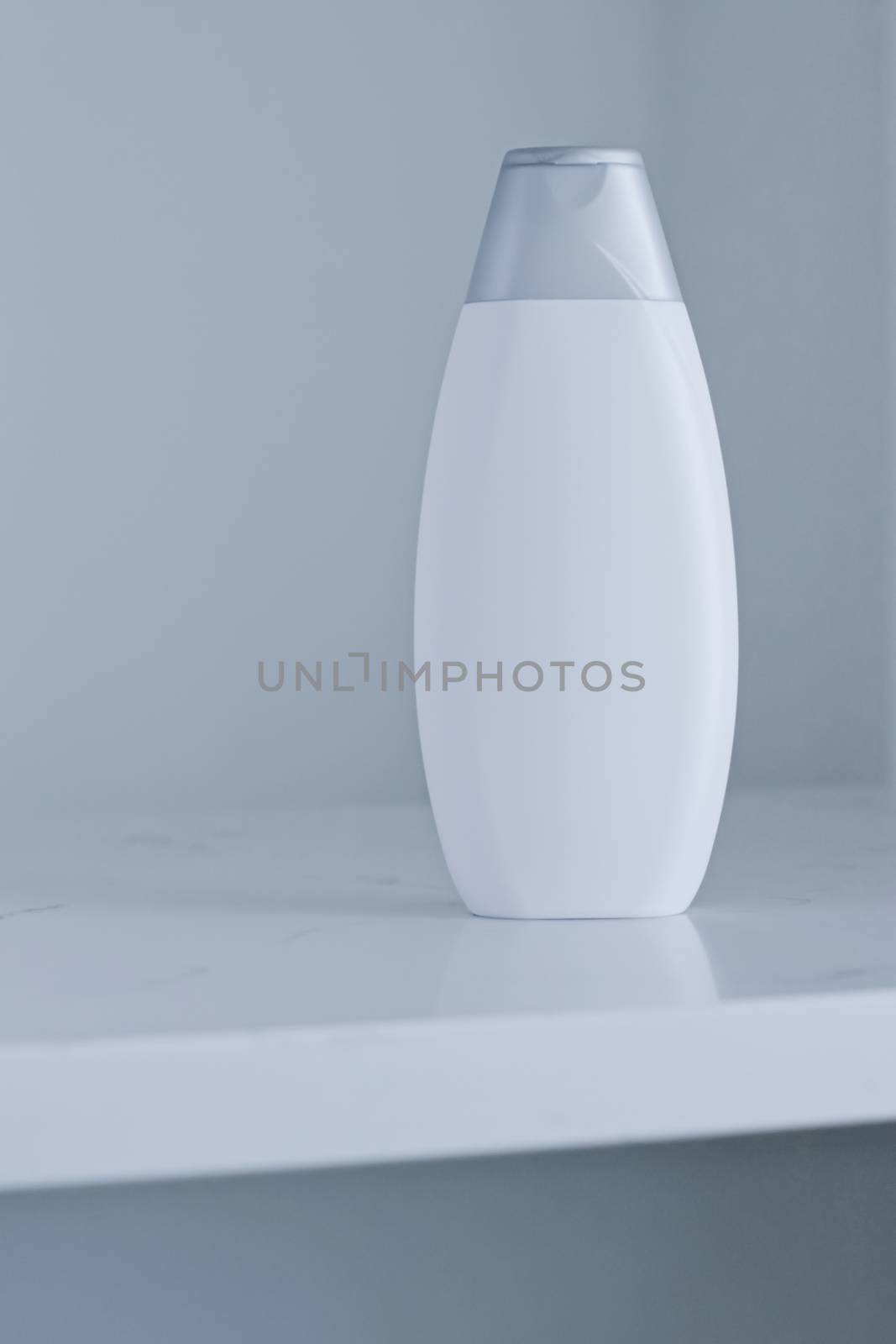 Blank label cosmetic container bottle as product mockup on gray background, hygiene and healthcare