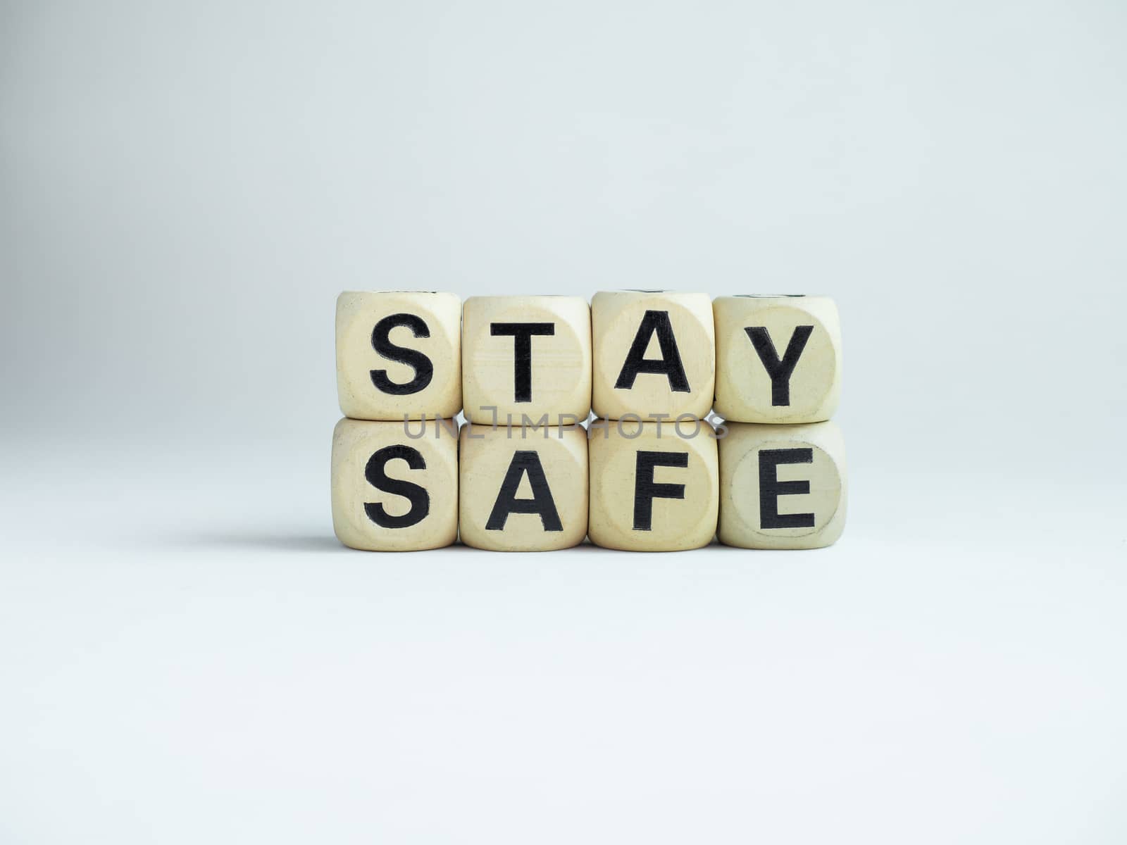 Stay safe concept. Word "Stay Safe" isolated on white background. Stay at home, social media campaign for covid-19 or coronavirus pandemic prevention.