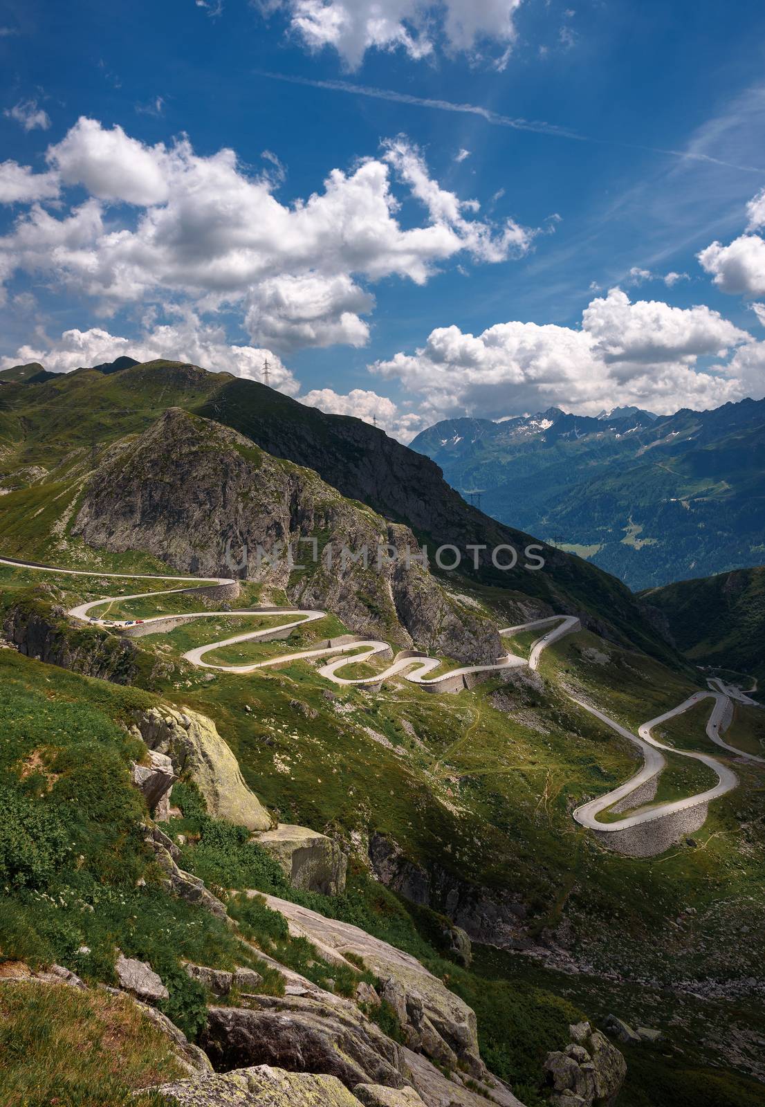 Aerial view of an old road going through the St. Gotthard pass in the Swiss Alps by nickfox