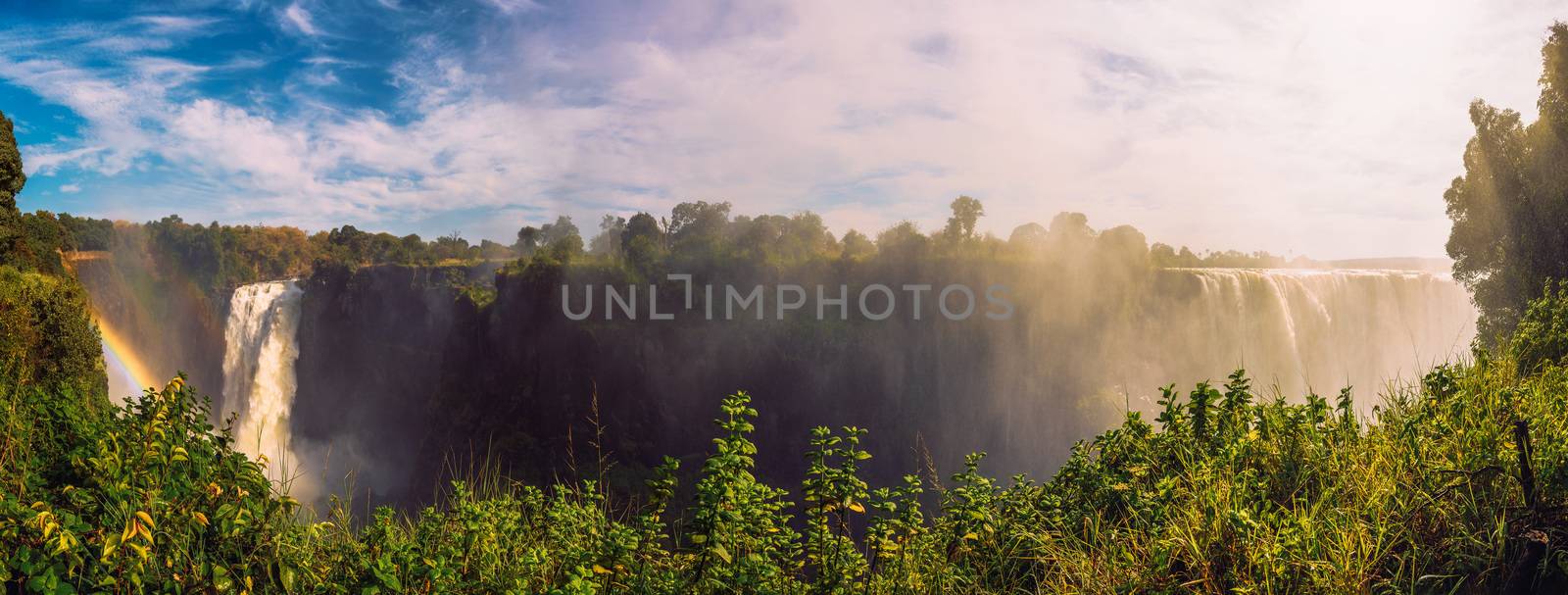 Panorama of Victoria Falls on Zambezi River in Zimbabwe by nickfox