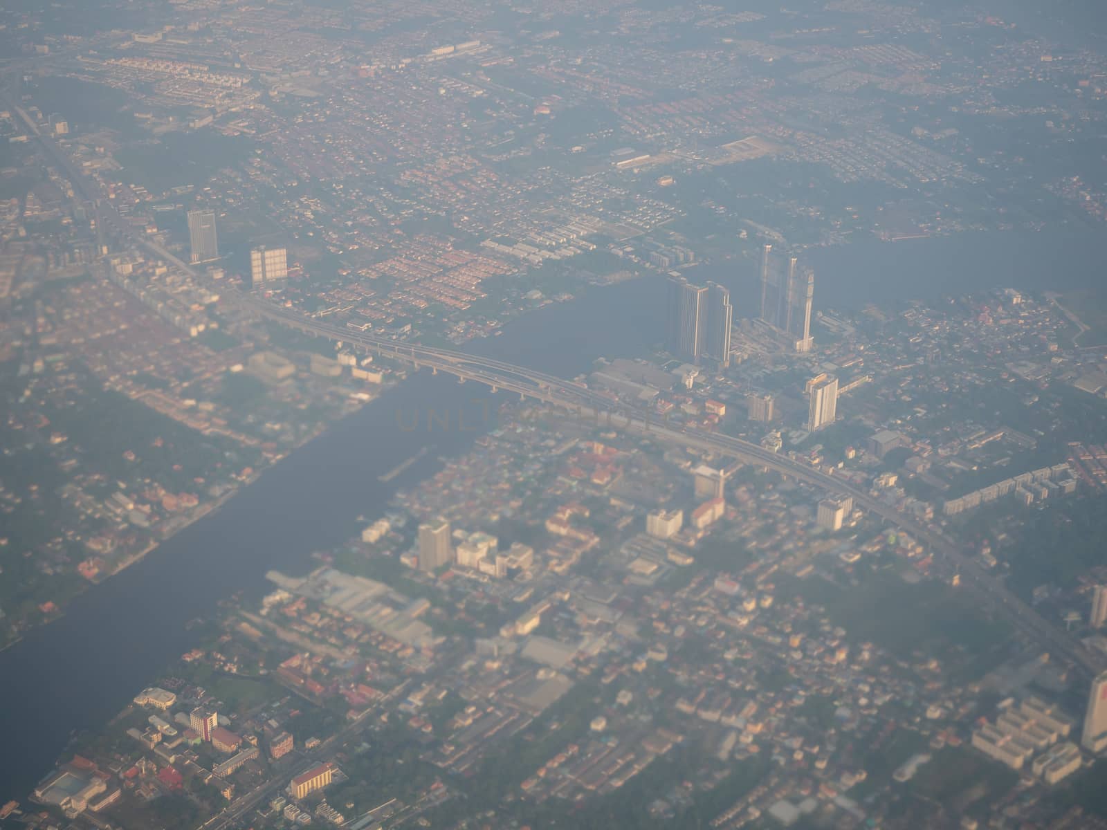 Bangkok / Thailand - 24 January 2020: high view from airplane of dusty view, PM 2.5 in the air, pollution in Bangkok city, Thailand.