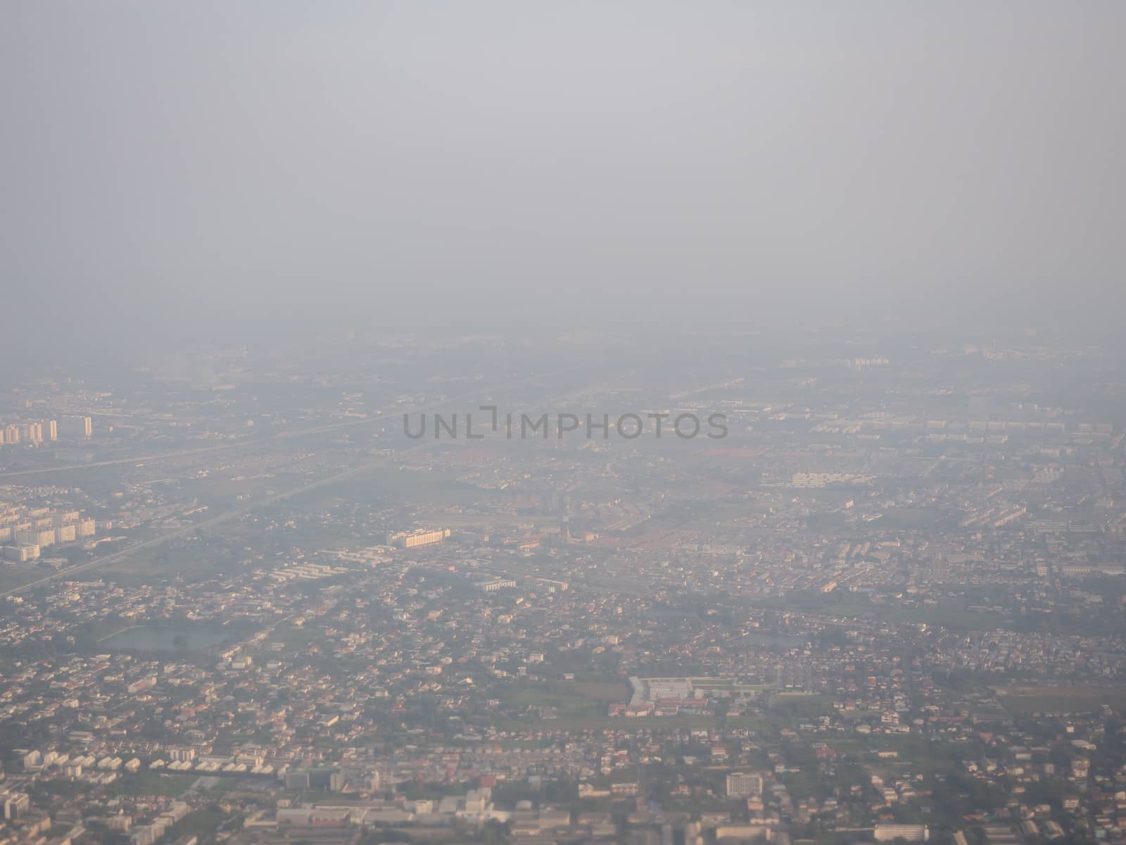 Bangkok / Thailand - 24 January 2020: high view from airplane of dusty view, PM 2.5 in the air, pollution in Bangkok city, Thailand.