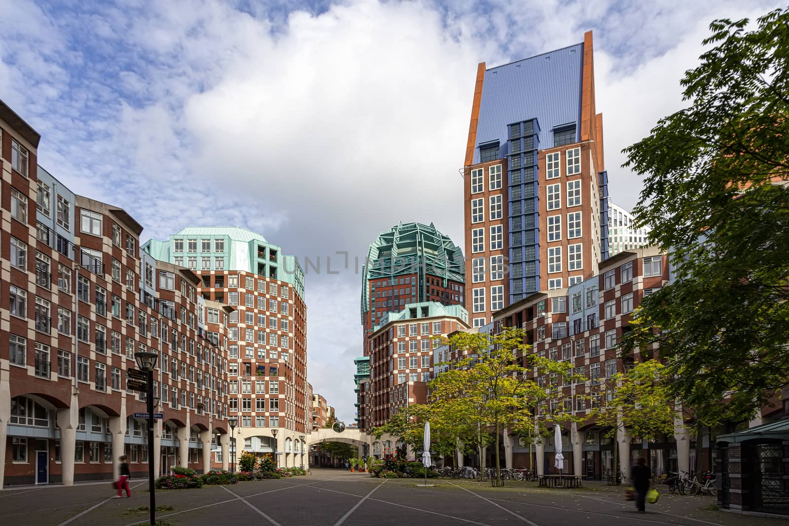 Street view of The Hague city center with the brick made skyscrapers imitating the traditional Dutch Flemish architecture, The Hague, Netherlands