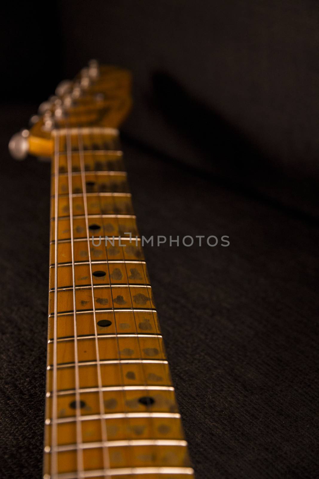 Close up of electric guitar handle with keys honed and stripped  by robbyfontanesi