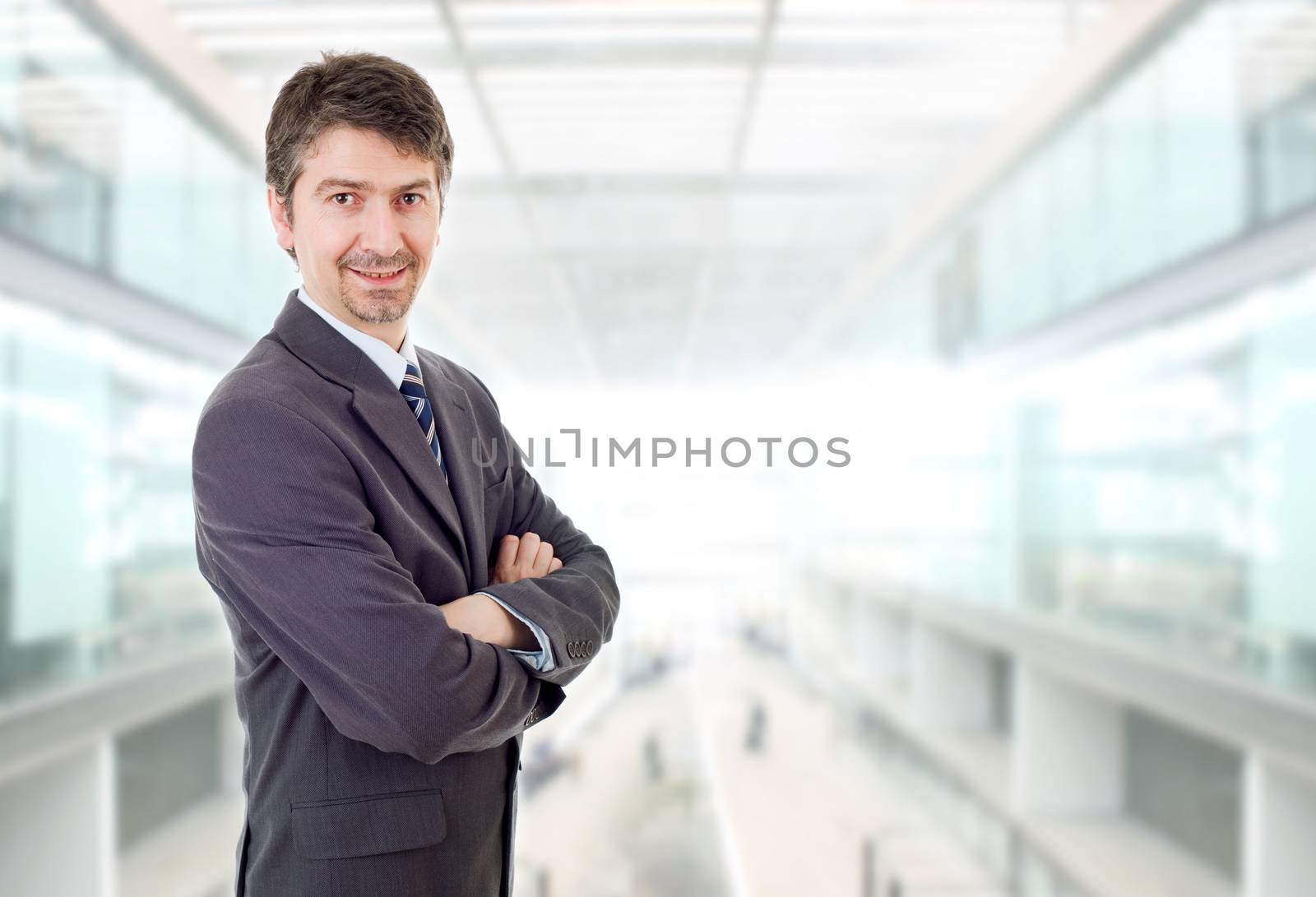 happy business man portrait at the office