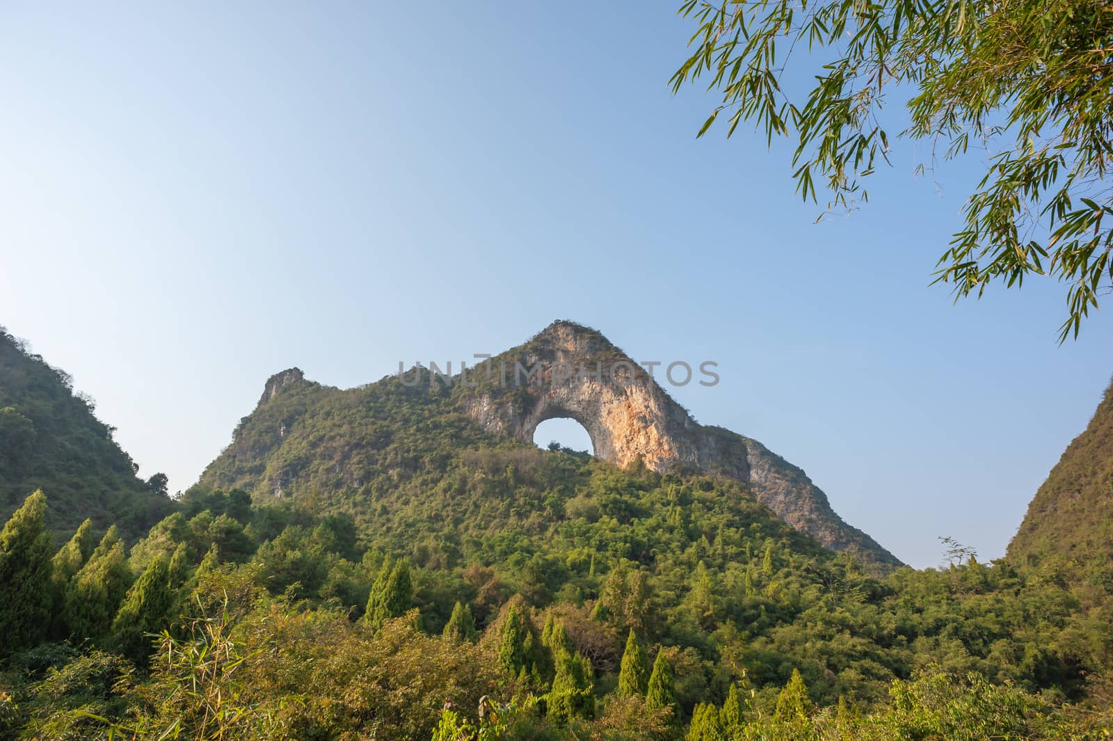 Moon hill arch karst formation in Yangshuo, Guilin, Guangxi province, China