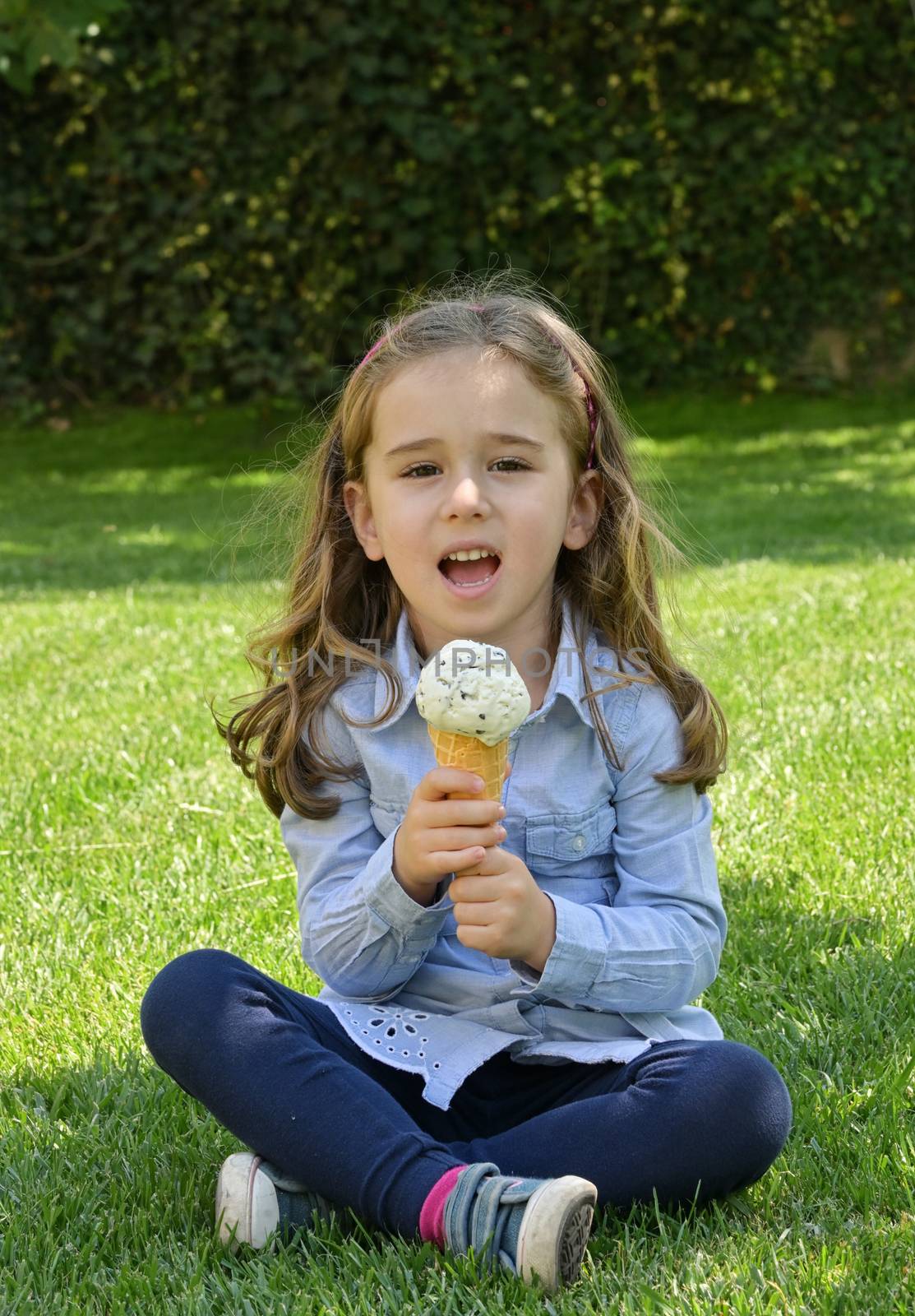 Little Girl Singing with A Ice Cream Microphone In Waffle Cone