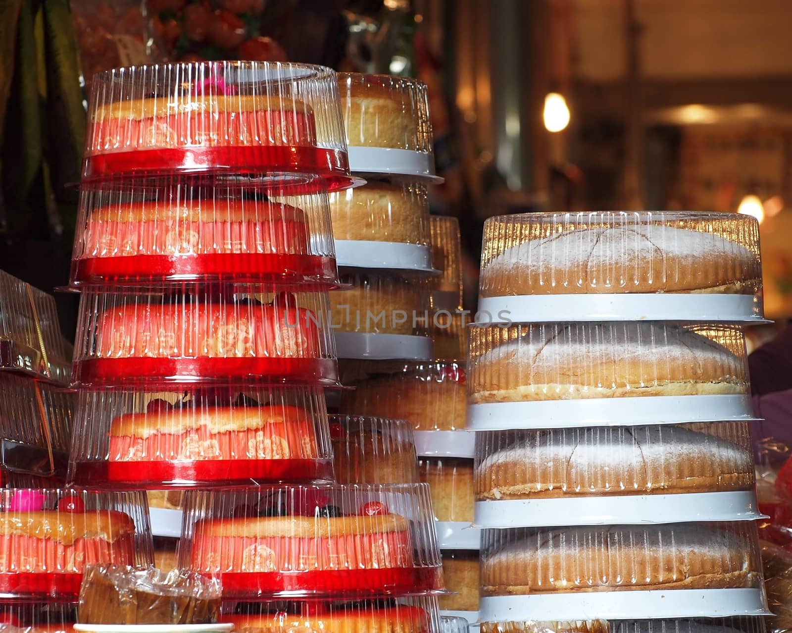 A bakery displays stacks of cakes in the run-up for the Chinese New Year
