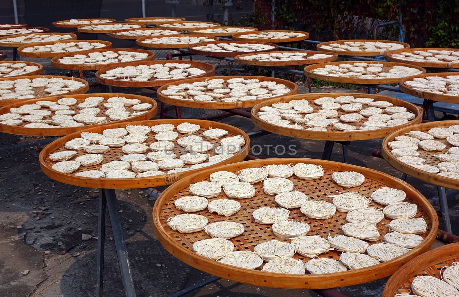 Handmade noodles dry in the sun at a traditional noodle manufacturer in Taiwan