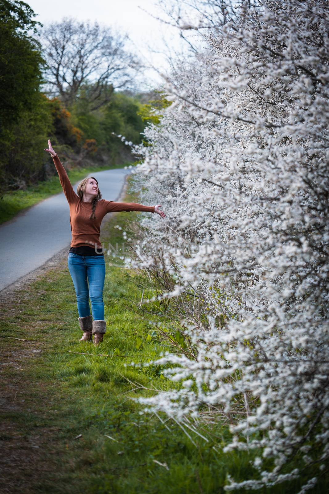 Woman by a Cherry Blossom Tree by samULvisuals