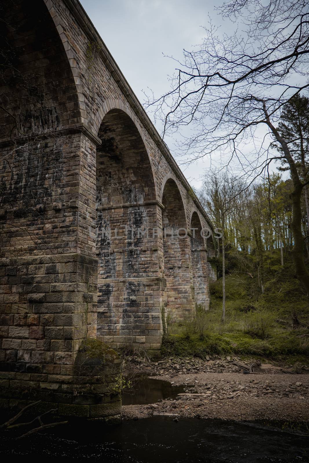 An old stone built British viaduct in the Yorkshire countryside