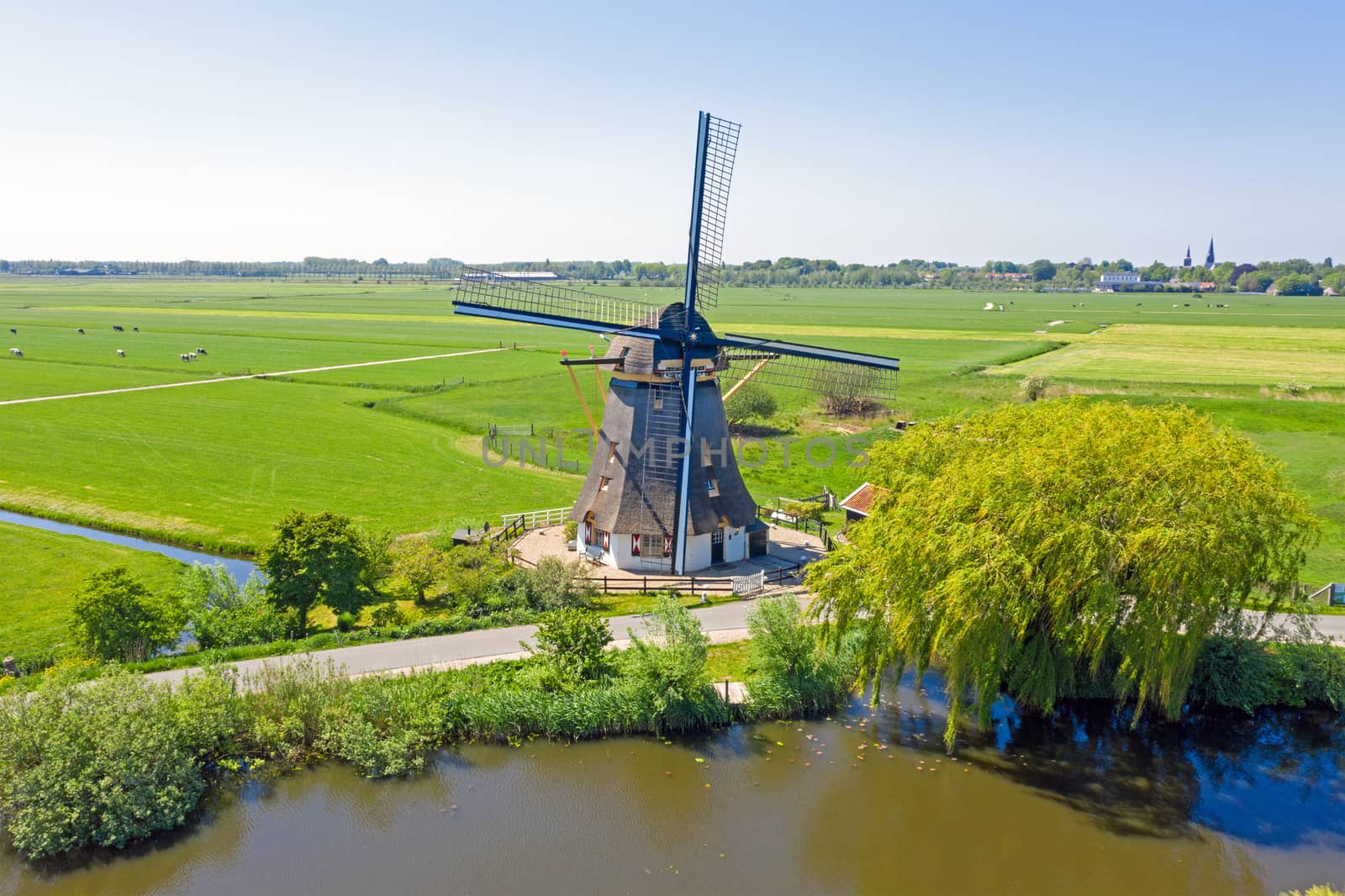 Oostzijdse Mill near Amsterdam in the countryside in the Netherl by devy