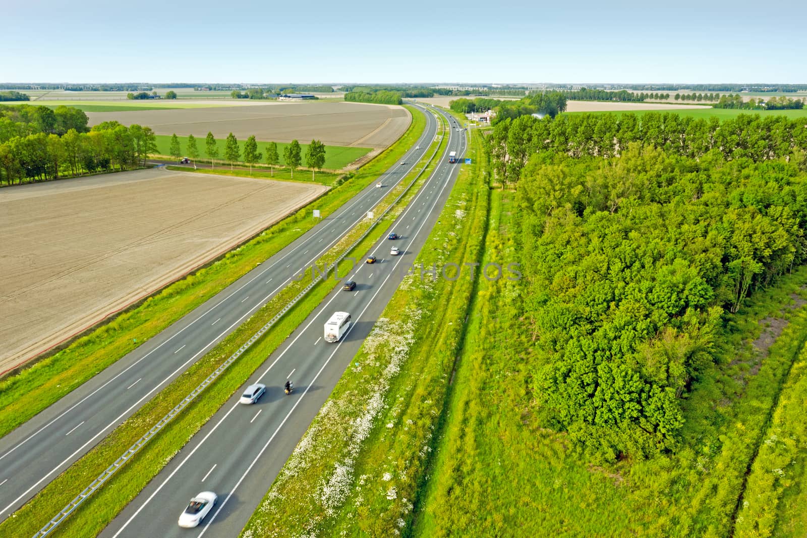 Aerial from the highway A6 near Almere in the countryside from t by devy