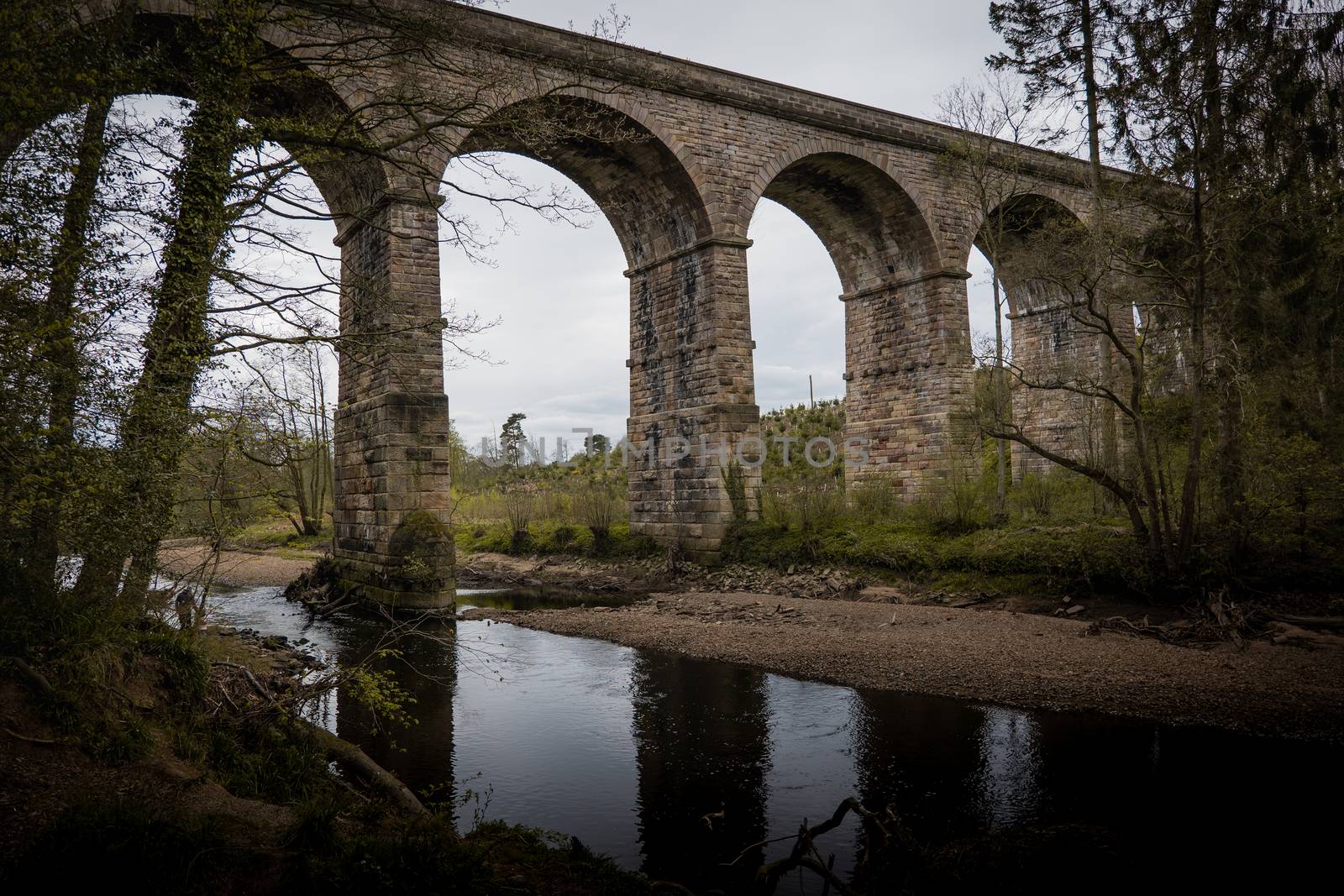 An old stone built British viaduct in the Yorkshire countryside