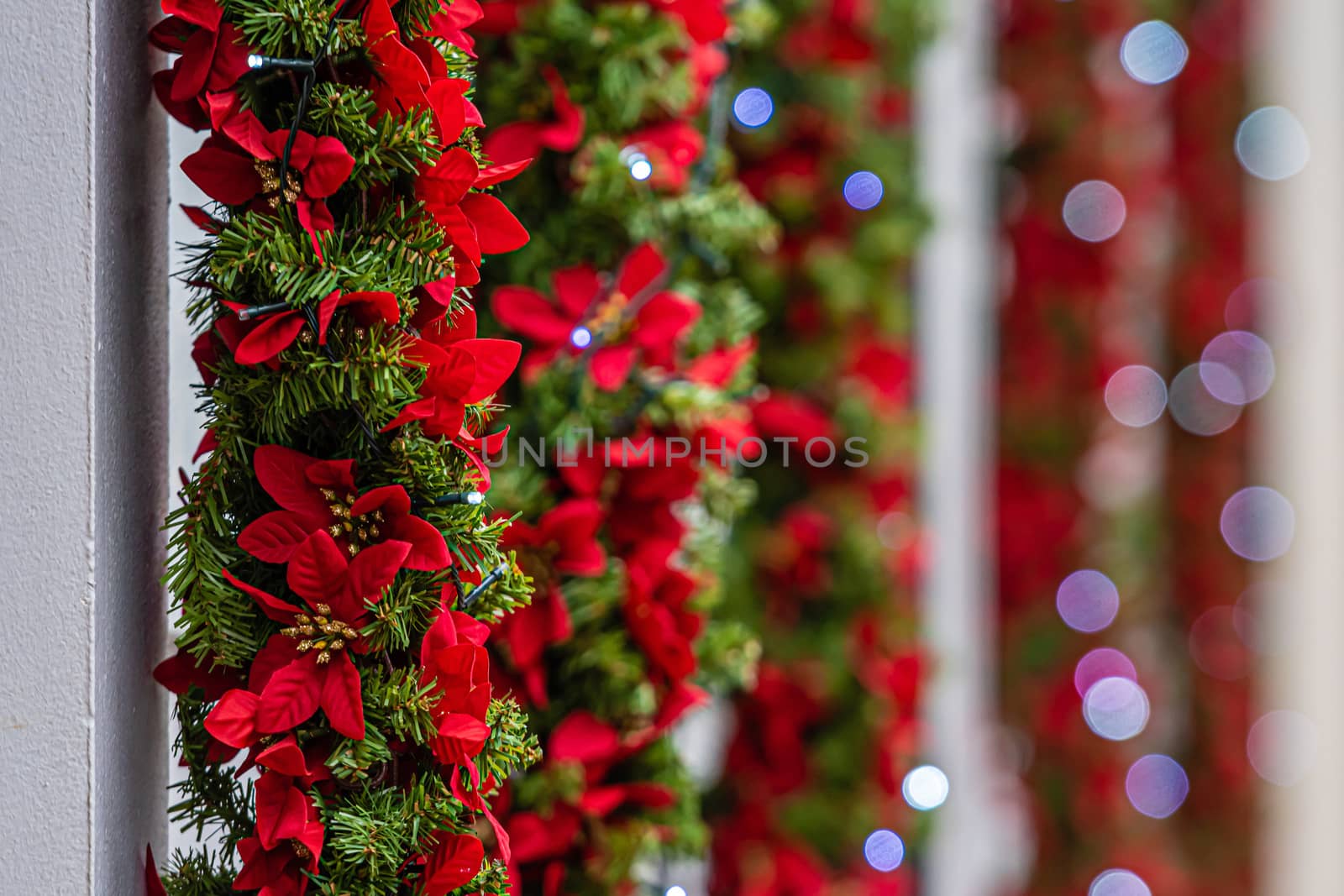 Christmas lights and decorations on the facade of the building, Selective focus, defocused Christmas background 