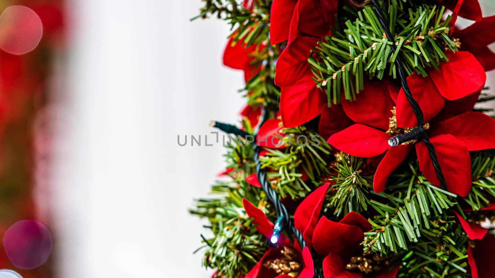 Christmas lights and decorations on the facade of the building, Selective focus, defocused Christmas background 