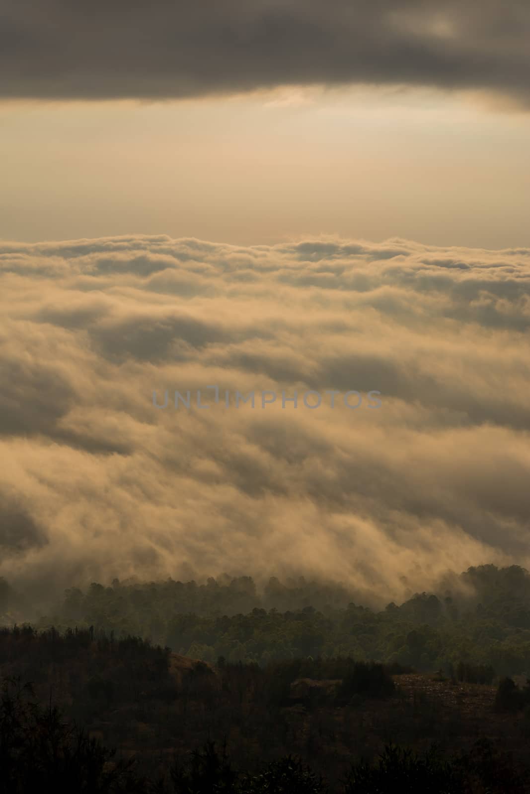 Scenic view of clouds and mist at sunrise from the top of mount Batur (Kintamani volcano), Bali, Indonesia