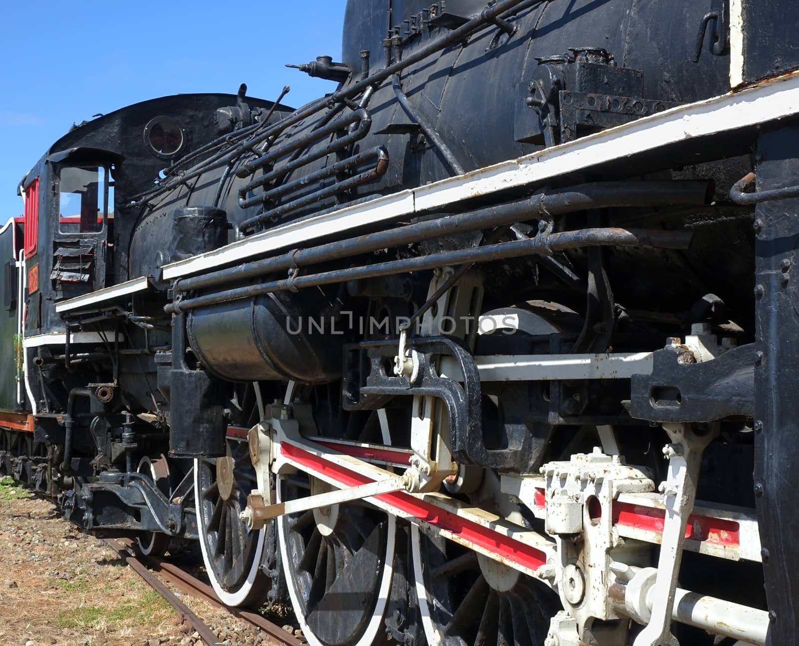 Side view of an old steam locomotive