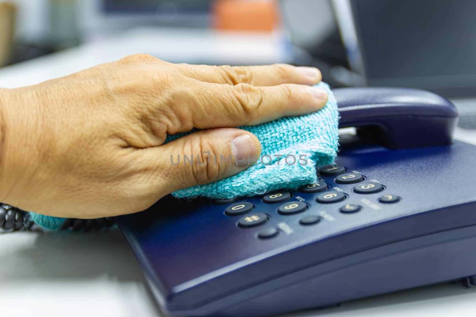 Concept Prevention cleaning frequently, Focus on the high traffic areas that enable pathogens to spread around the telephone equipment such Phone button 