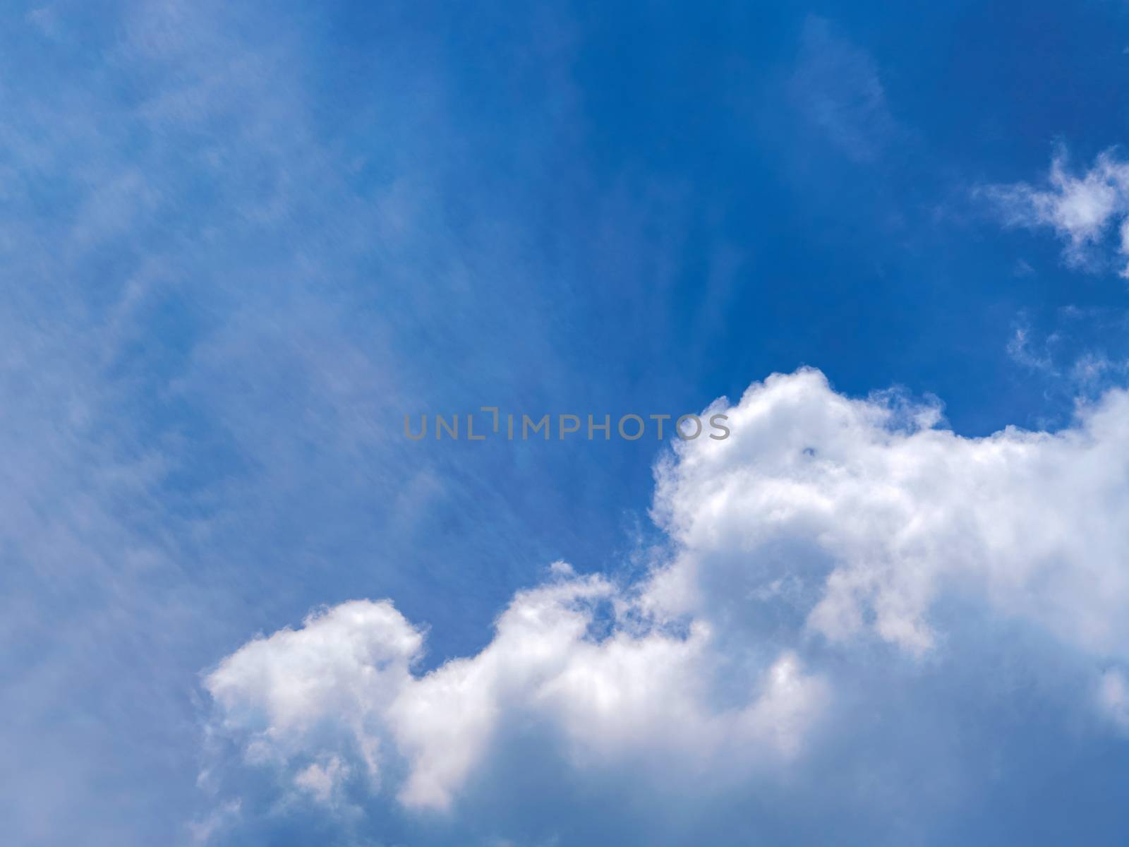 Big white cloud in clear blue sky. Nature Background by chadchai_k