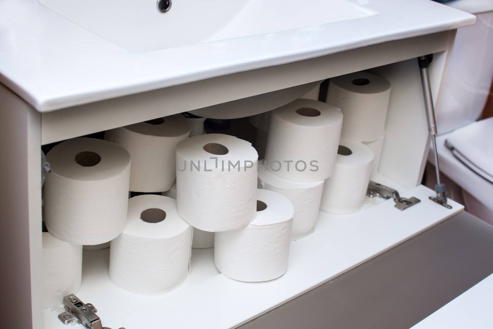 Paper rolls in bathroom furniture