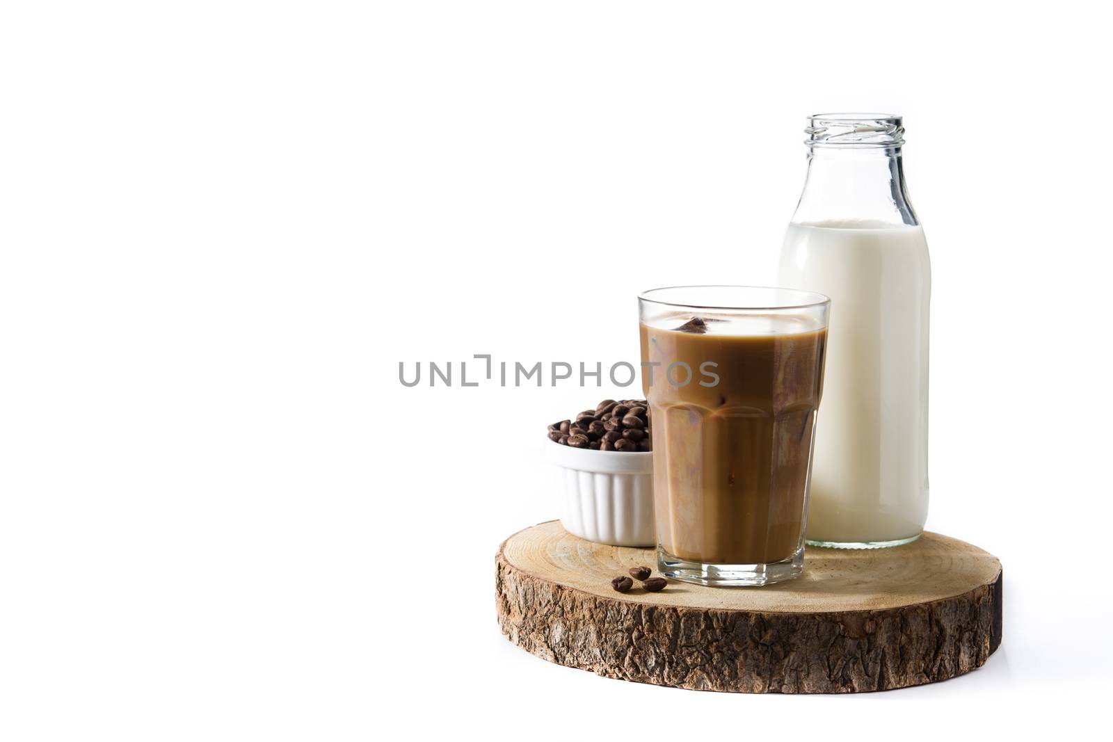 Iced coffee or caffe latte in tall glass by chandlervid85