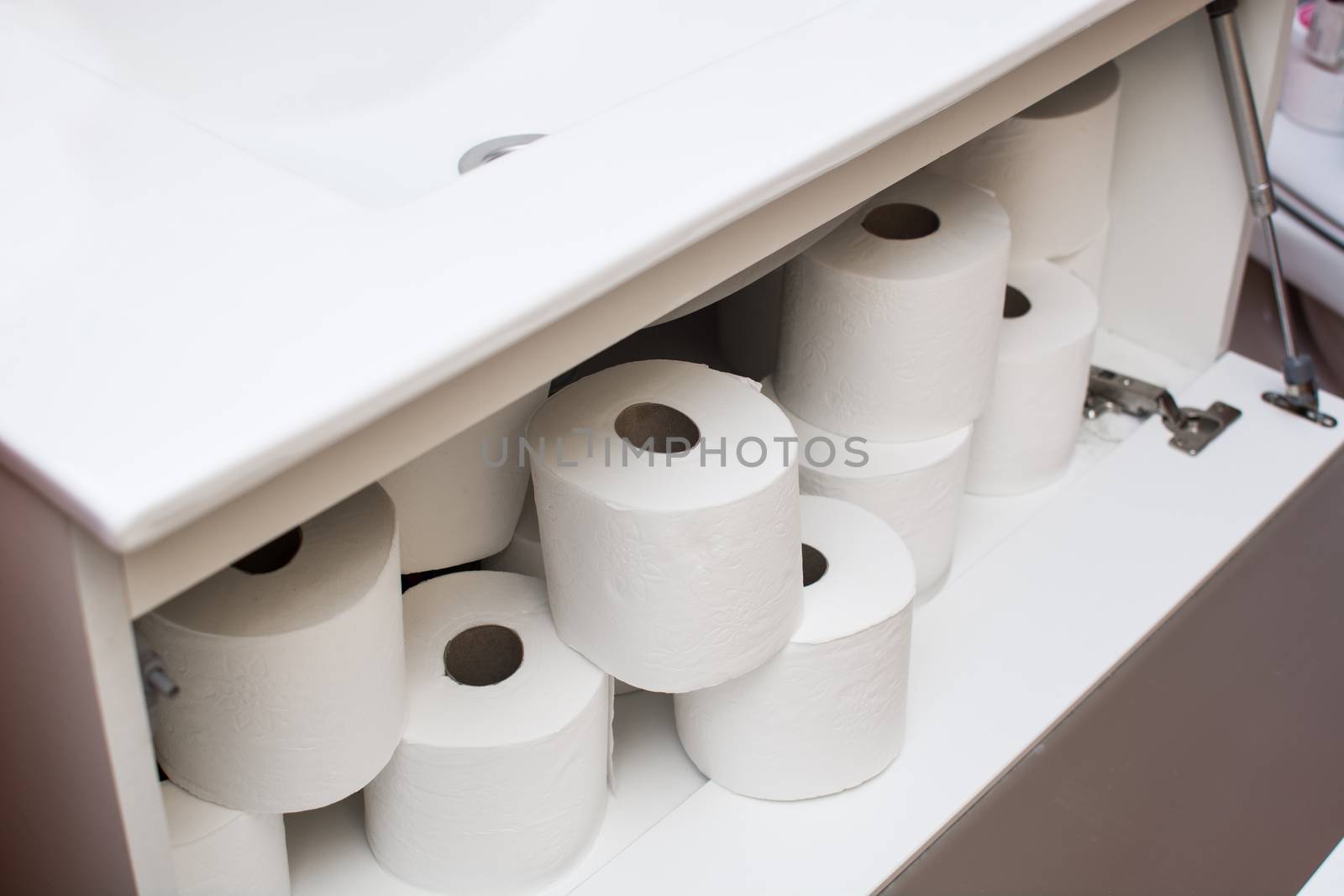 Paper rolls in bathroom furniture