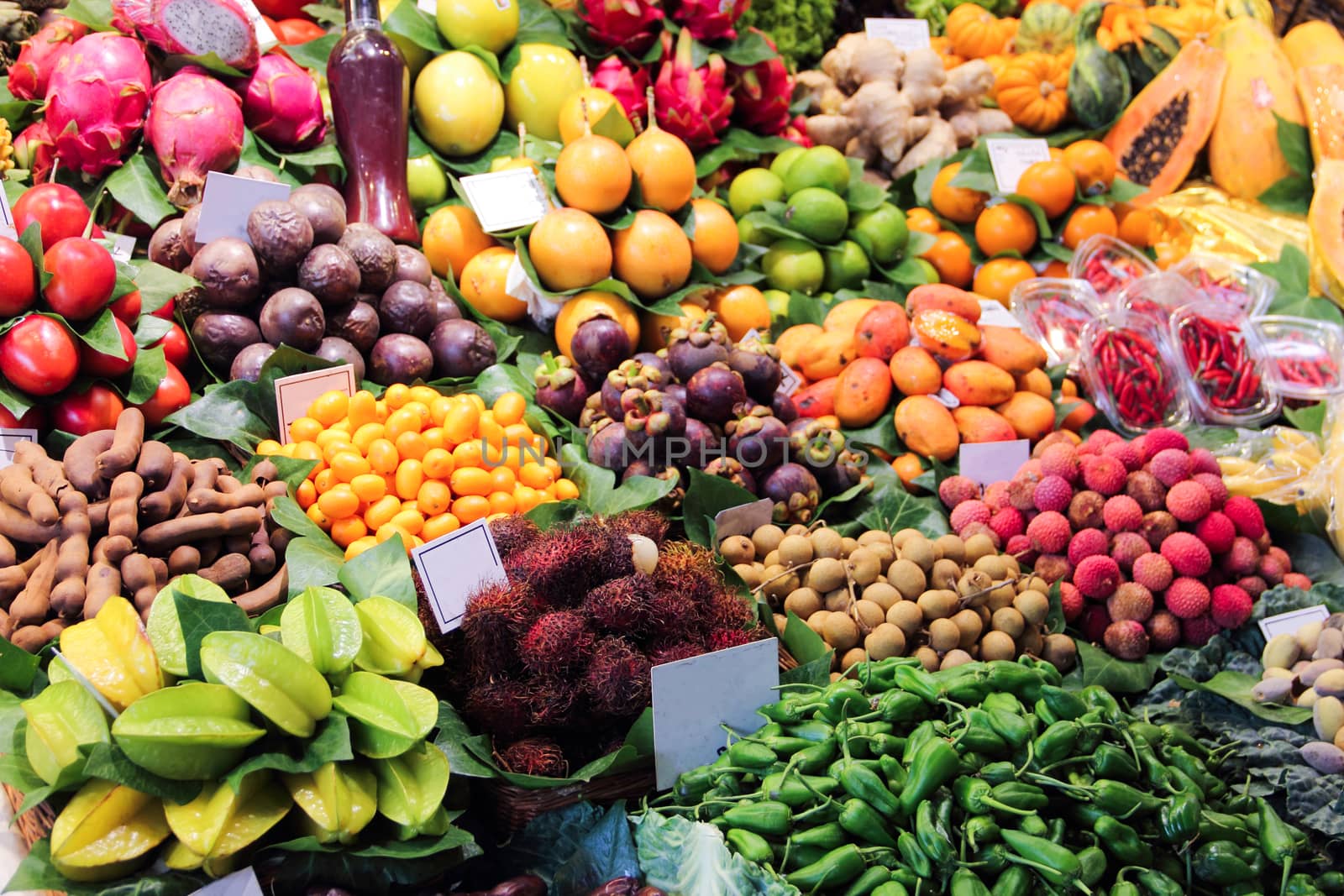 Tropical fruits variation stall at the market close up
