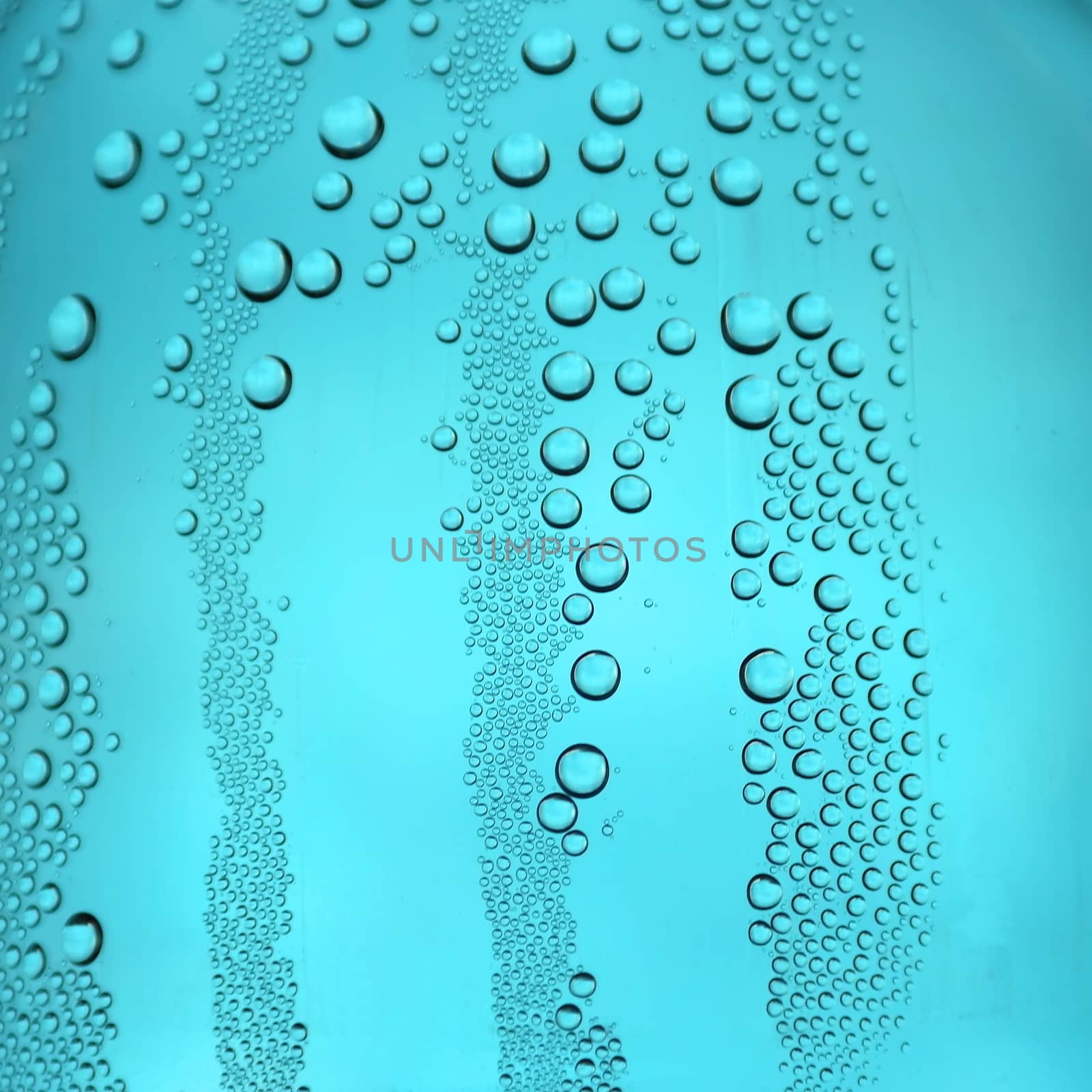 Drops of water on the crooked glass, shallow dof