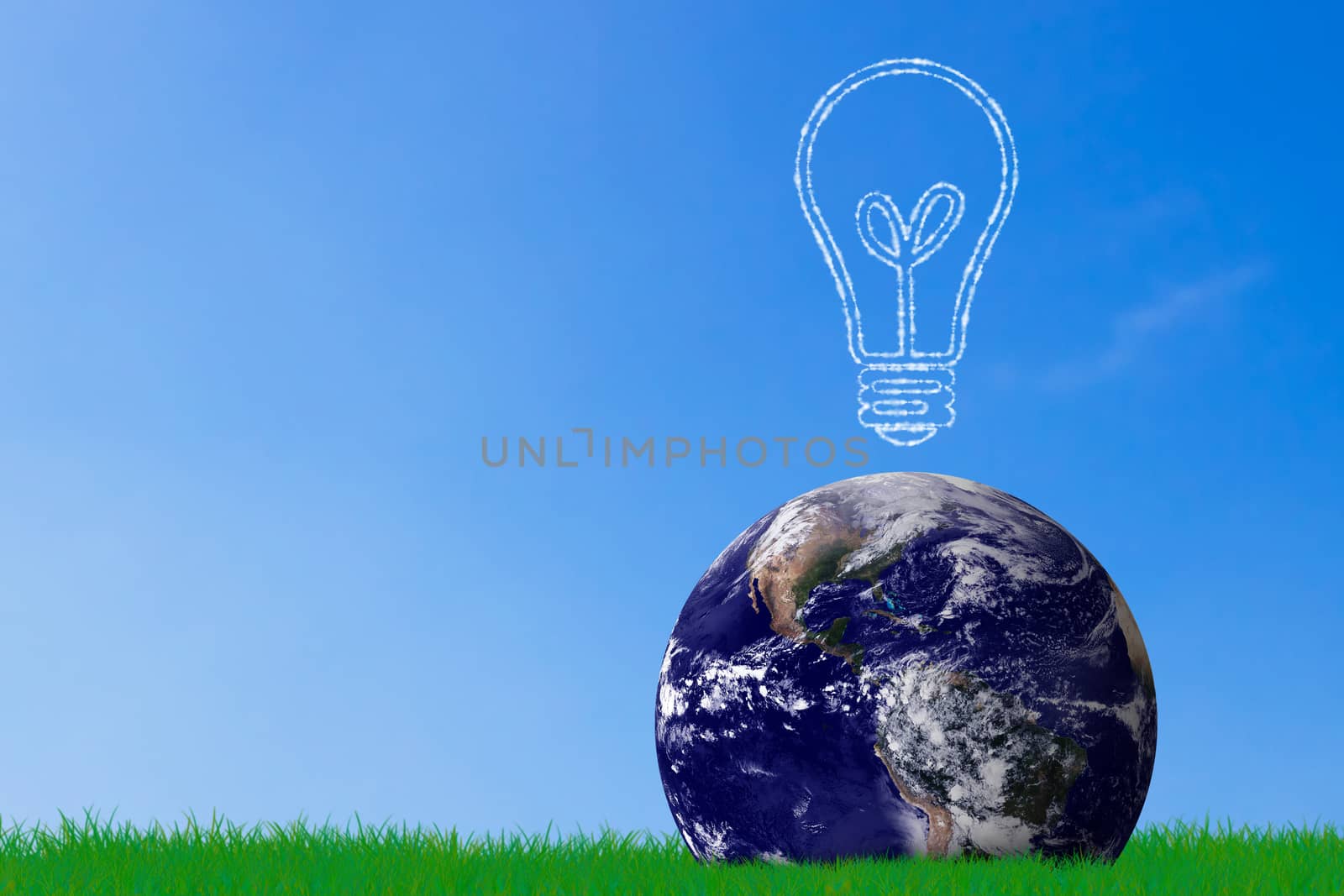 Green energy concept, the earth and light bulb on grass background, nature and ecology, Elements of this image furnished by NASA