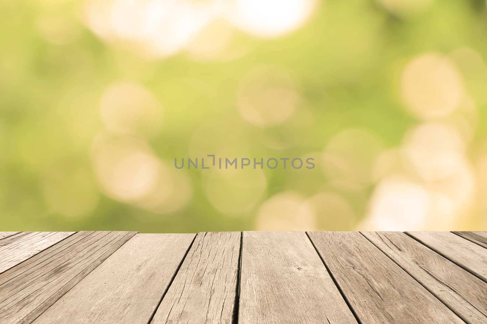 Old wooden floor with blurred background.