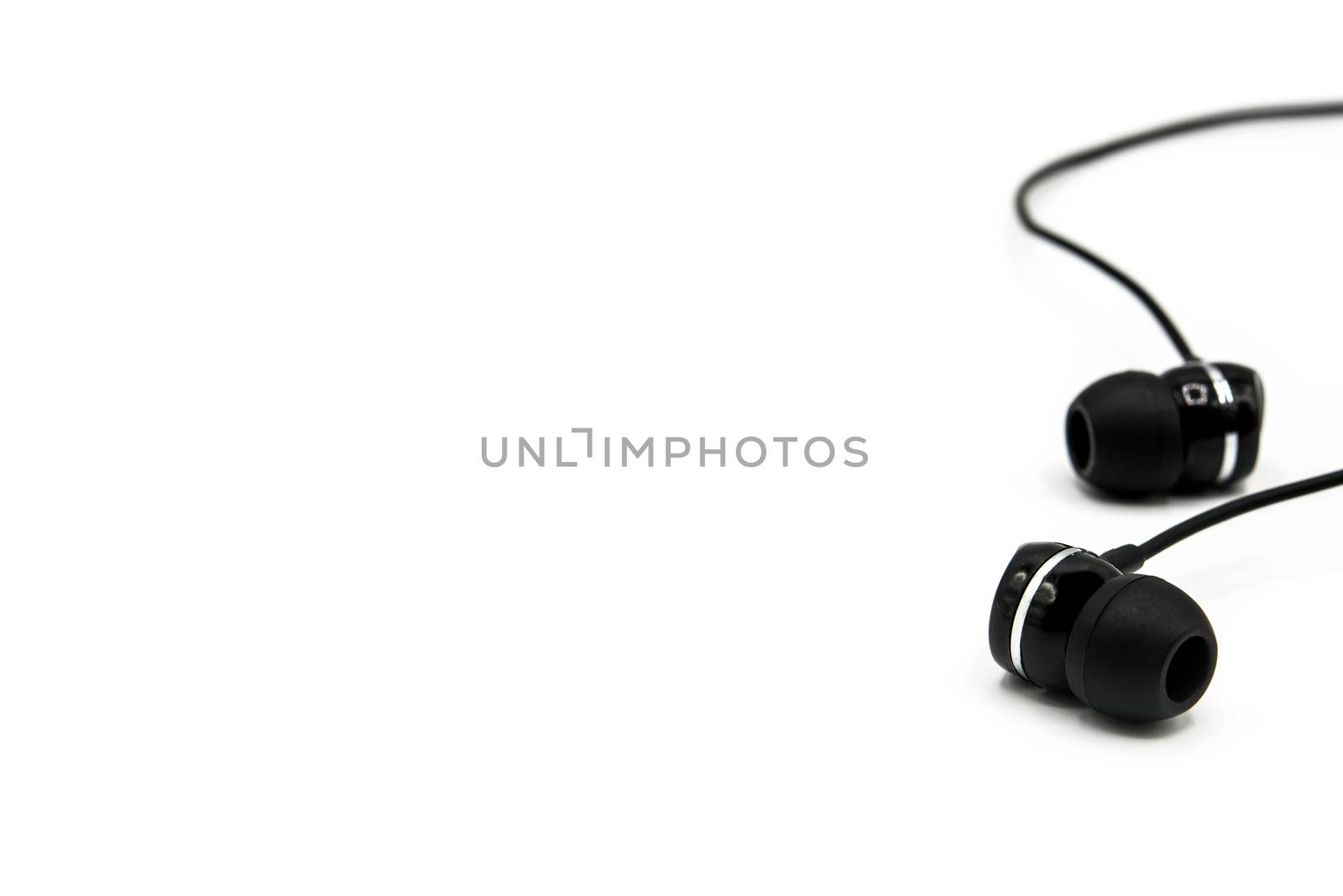 Black earphones isolated on white background