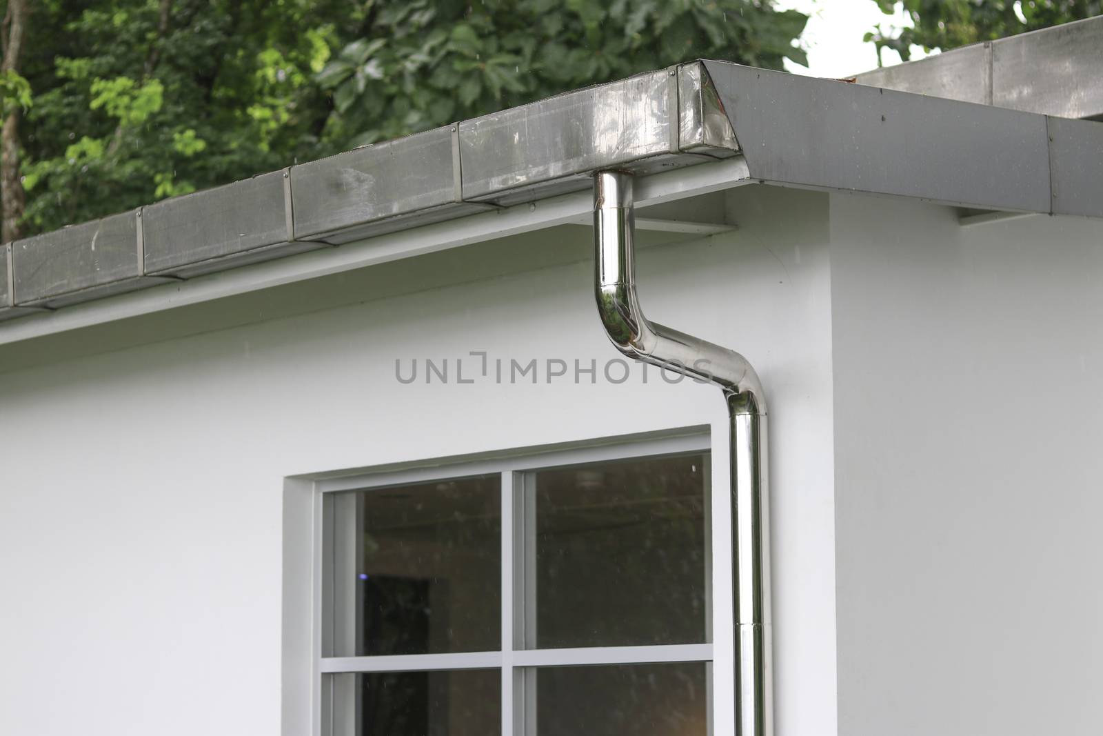 Rain gutters and pipes for drainage of rainwater from the roof.
