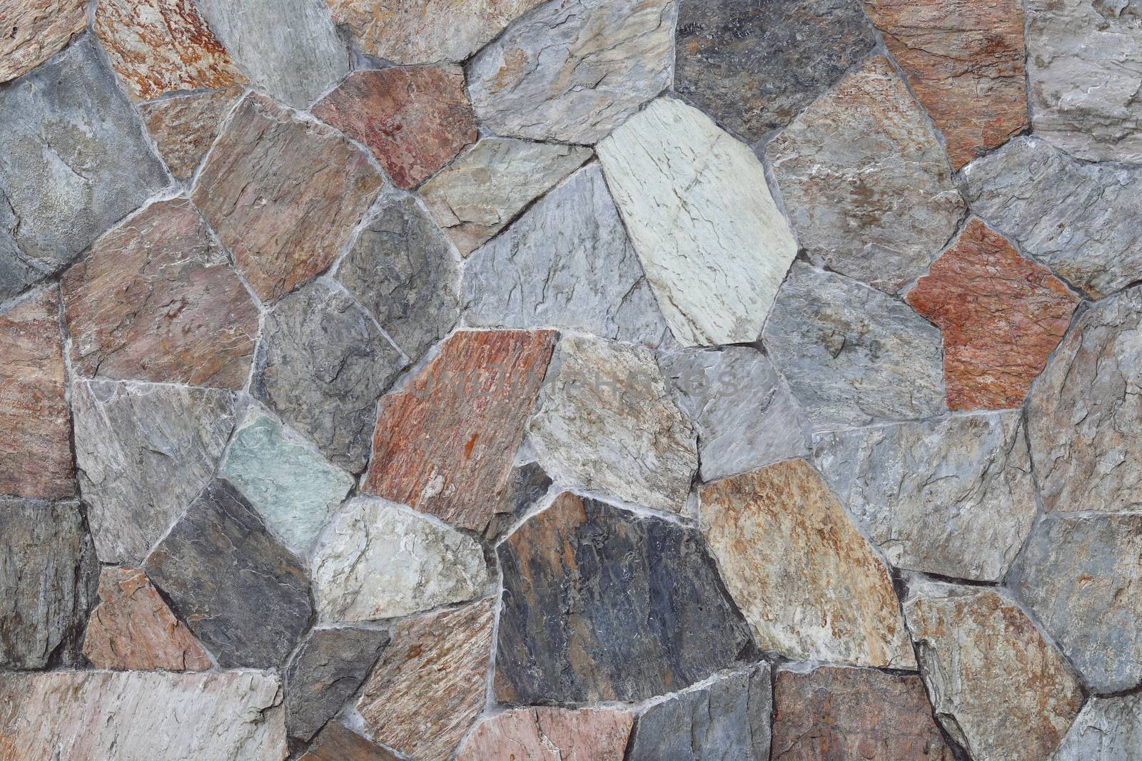 Stone slab as background. The background consists of many rock sheets. by Eungsuwat