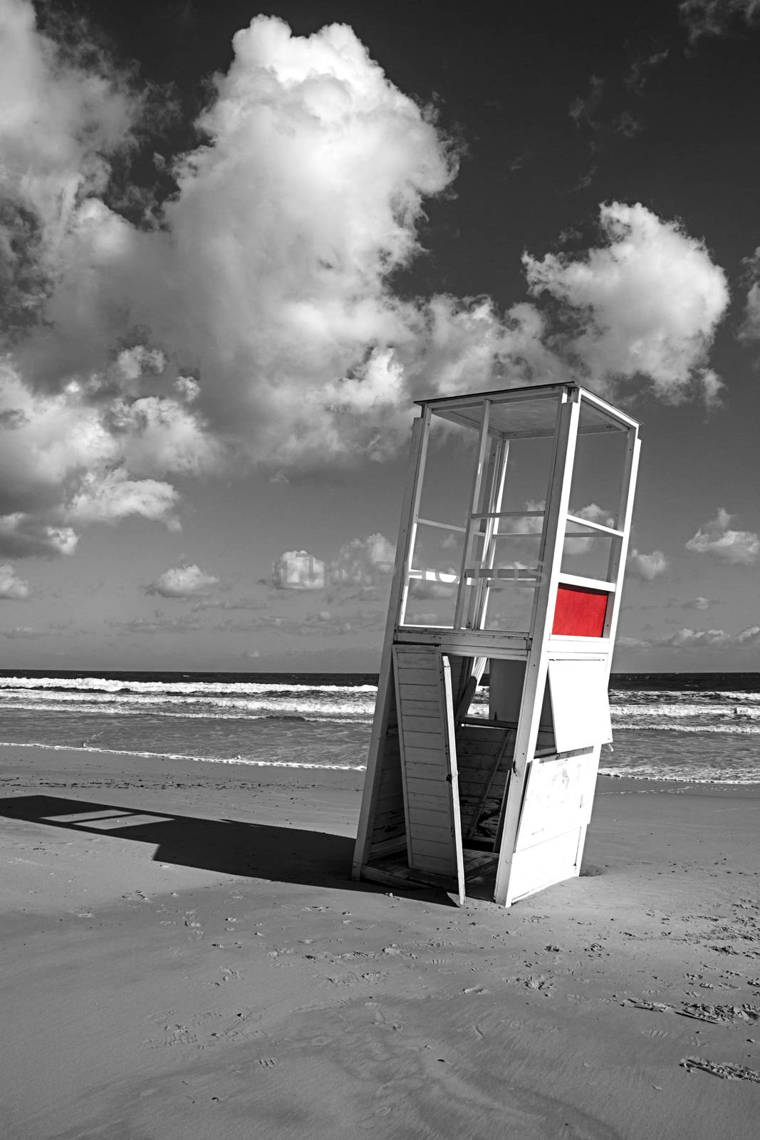 Watchtower in the winter sea. After a whole season of work helping the man in his surveillance task, he rests on his side, abandoned to the bad weather of the sea.