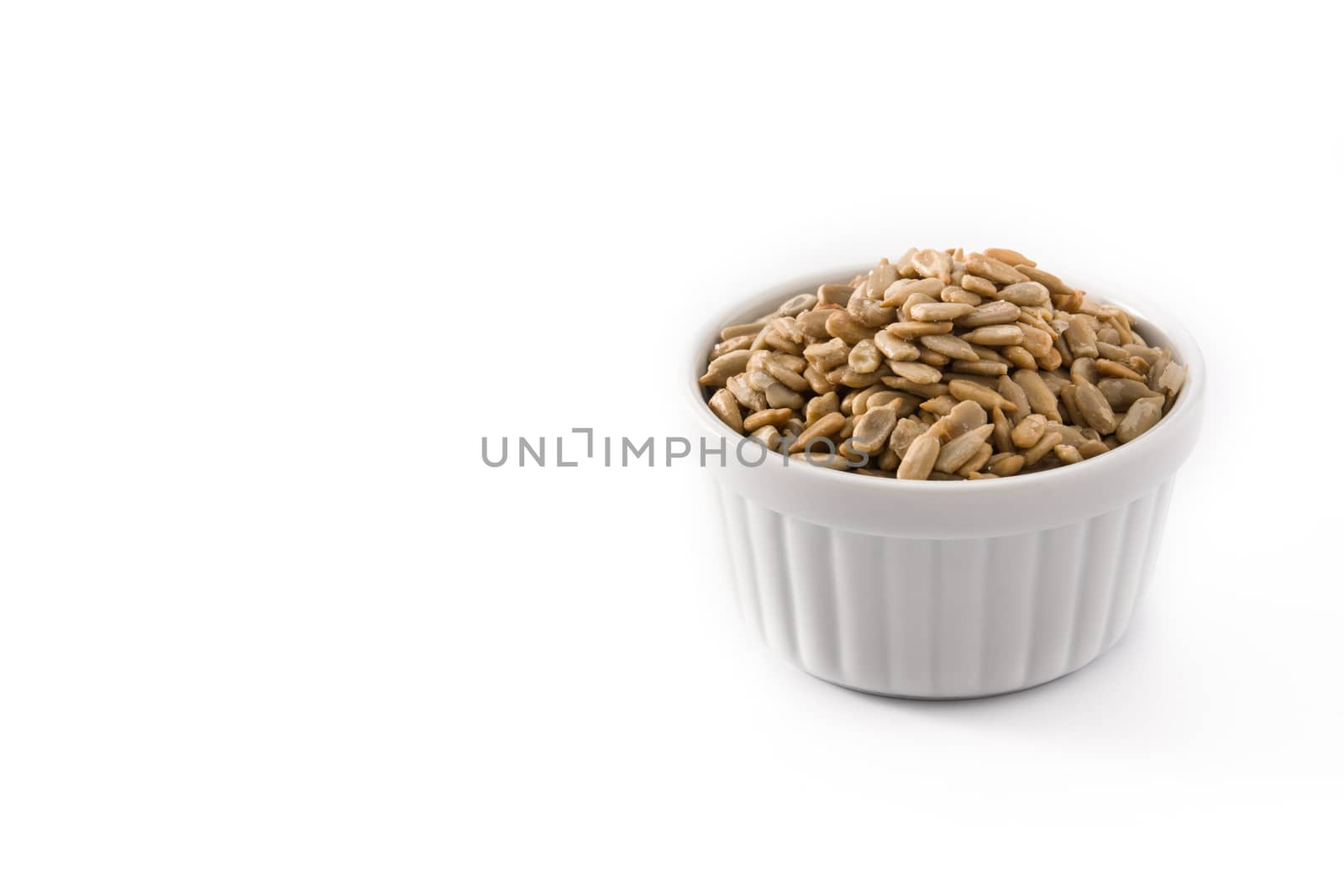 Sunflower seeds in bowl by chandlervid85