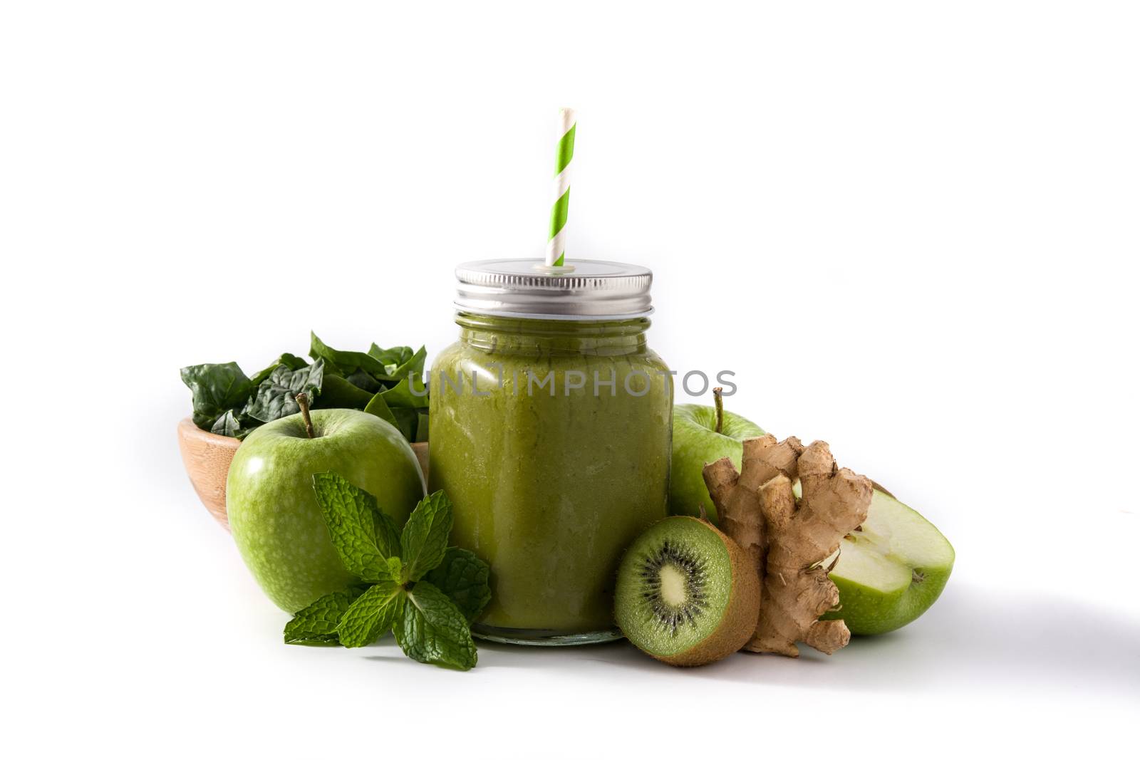 Healthy green smoothie in jar isolated on white background