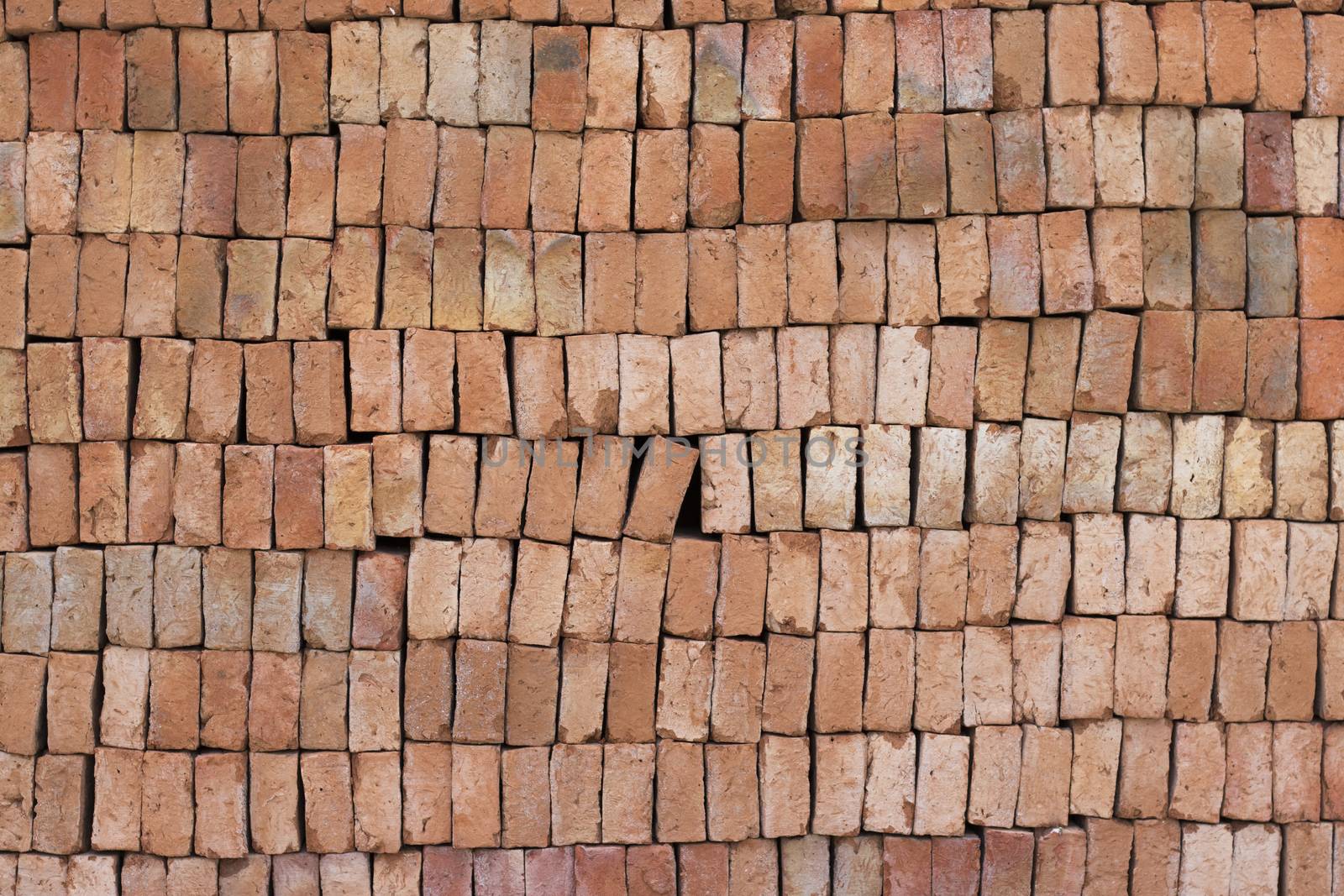 Red bricks arranged in a row. Red bricks pattern background. Red bricks background.