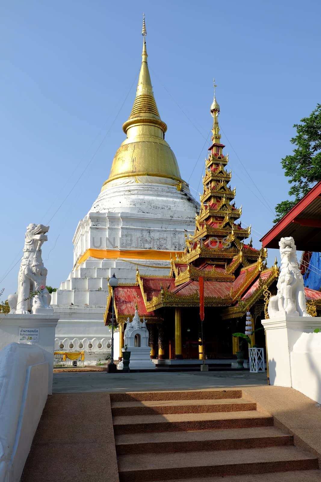 Ancient Pagoda at Wat Phra Kaew Don Tao Temple in Lampang Province, Thailand.