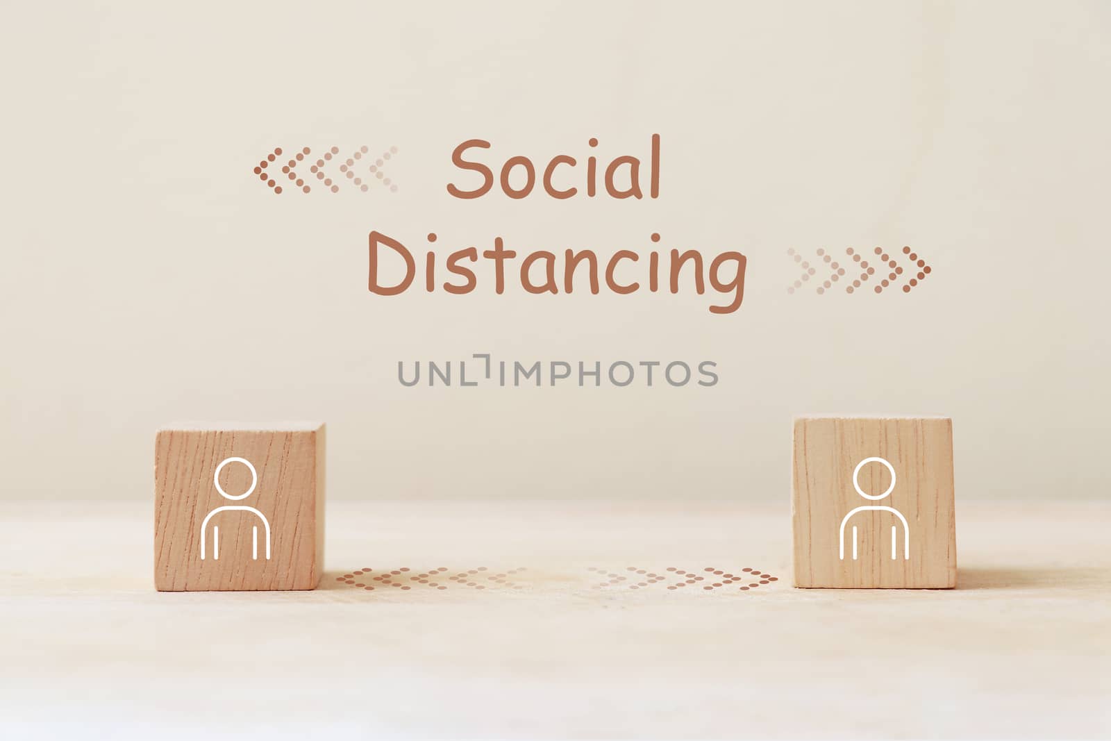Social distancing for reducing the risk of infection. Person icon on wooden cube with social distancing concept. by Eungsuwat