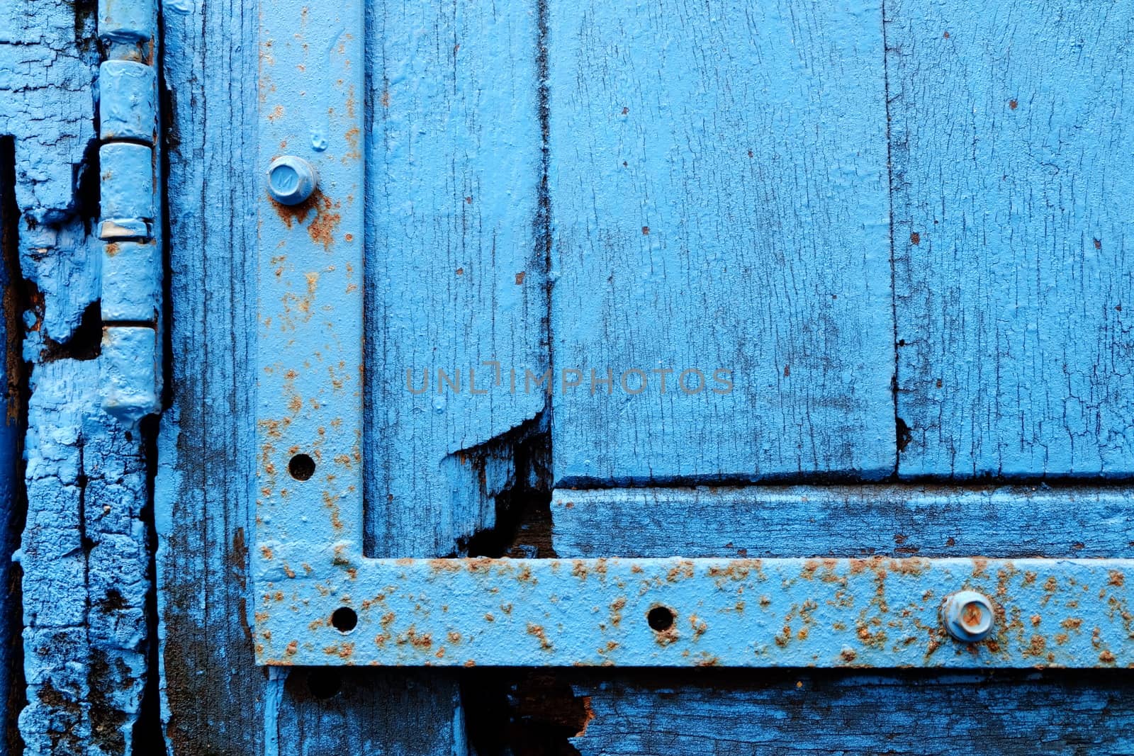 Close up Old Blue Wood Door Background. by mesamong