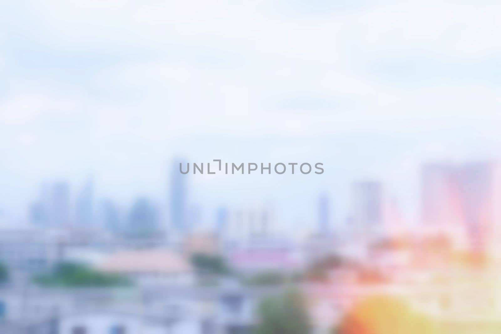 Blurred Cityscape Background with Light Leak.