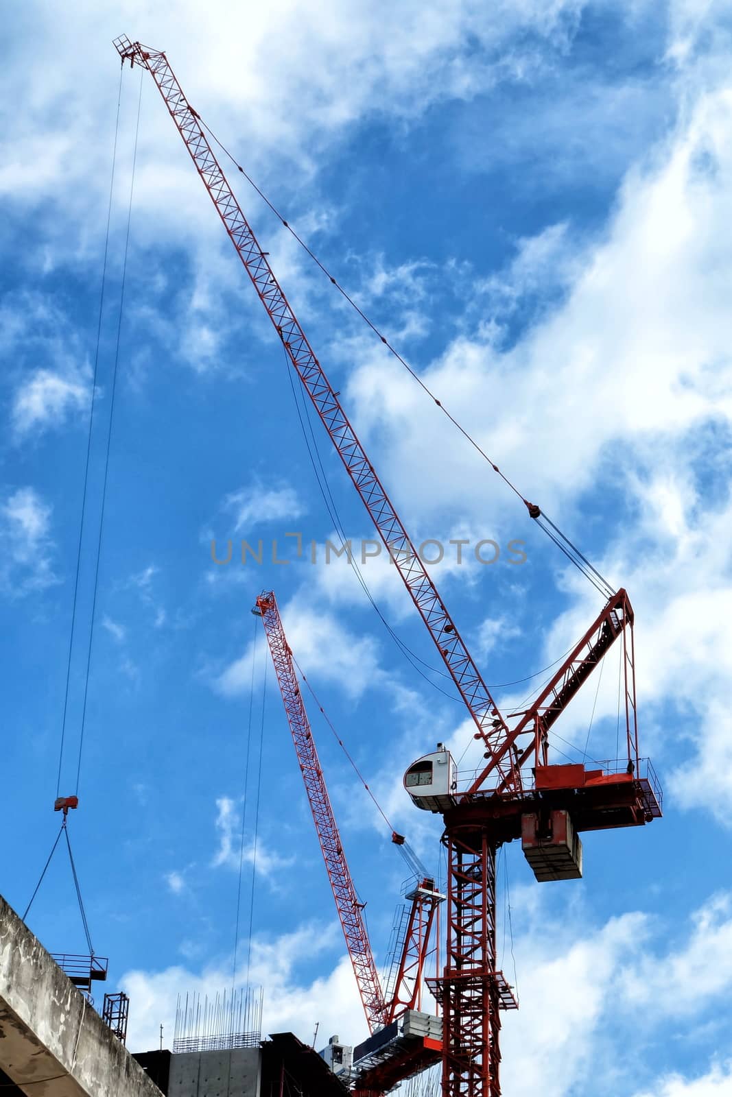 Crane (machine) with Sky and Cloud Background.