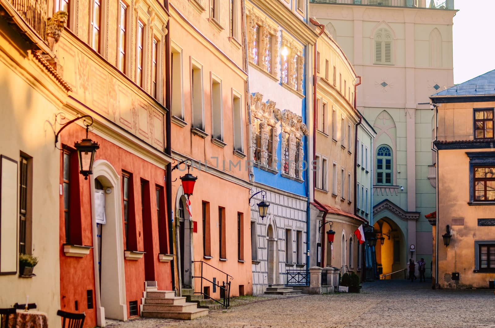 Slanted colorful houses in the old town in Lublin, Poland by chernobrovin