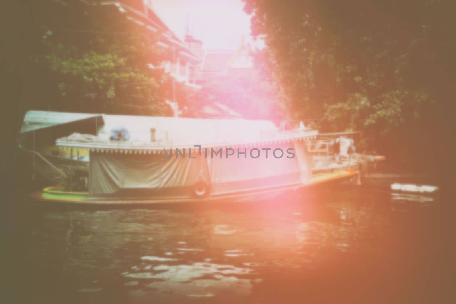 Blurred Board Floating on Canal. by mesamong