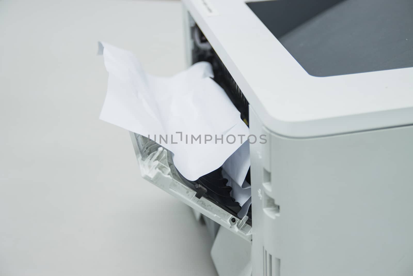 Paper A4 Stuck In Printer At Office, concept repair printer