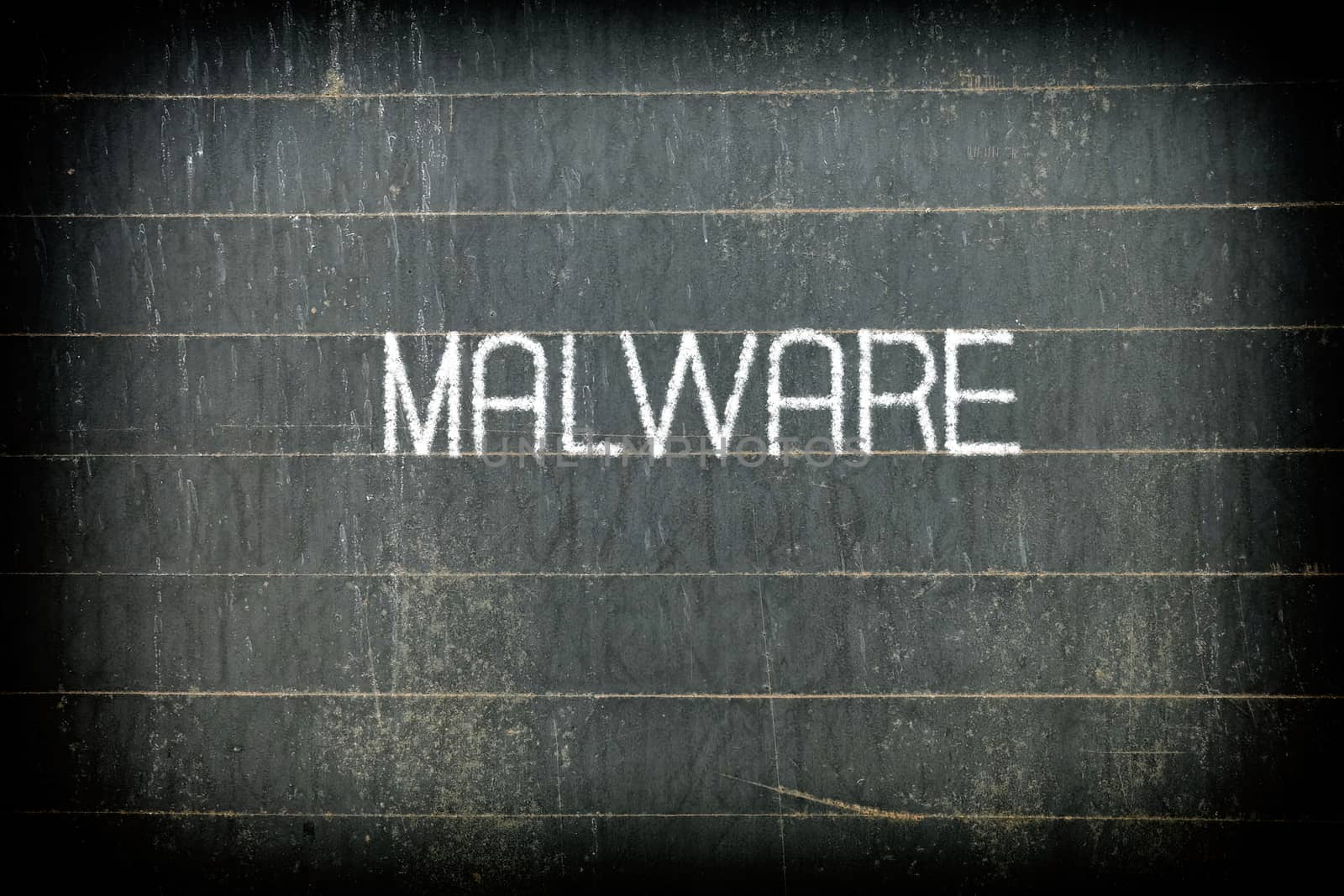"MALWARE" Chalk Writing on Old Chalkboard Background. by mesamong