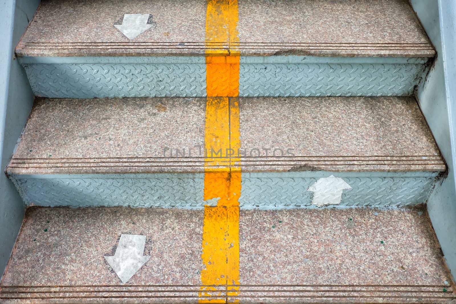 Up and Down Arrows on Stair.