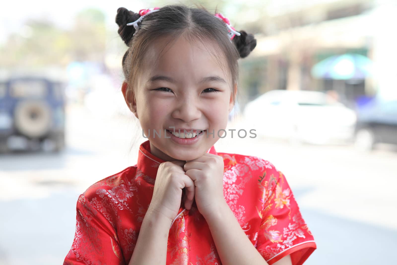 Chinese girl in traditional Chinese cheongsam by piyato