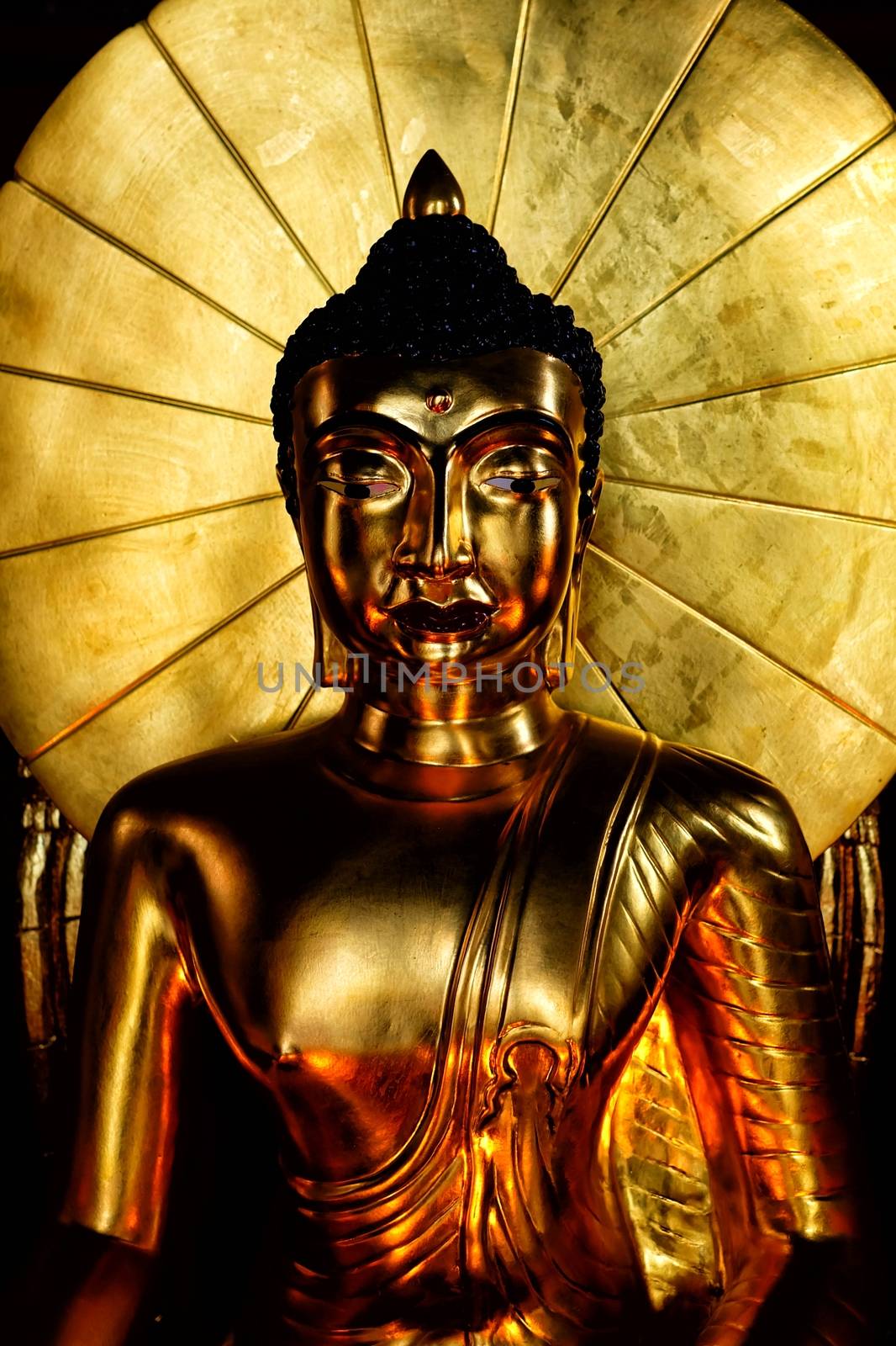 Close-up Ancient Golden Buddha Image.